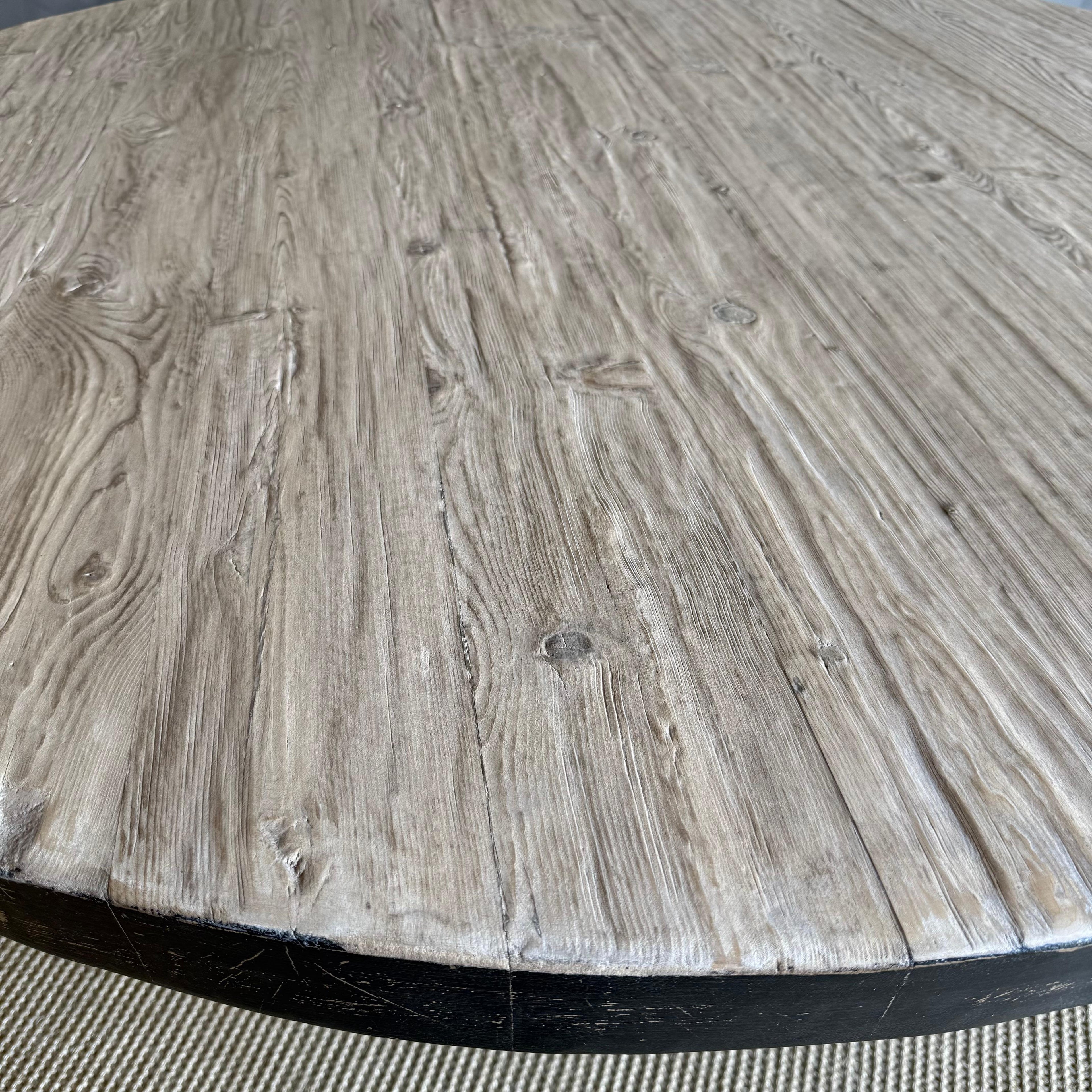 https://a.1stdibscdn.com/reclaimed-pine-wood-60-round-dining-table-with-black-painted-finish-for-sale-picture-12/f_18223/f_459068621752701224573/7L_15_14_master.jpg