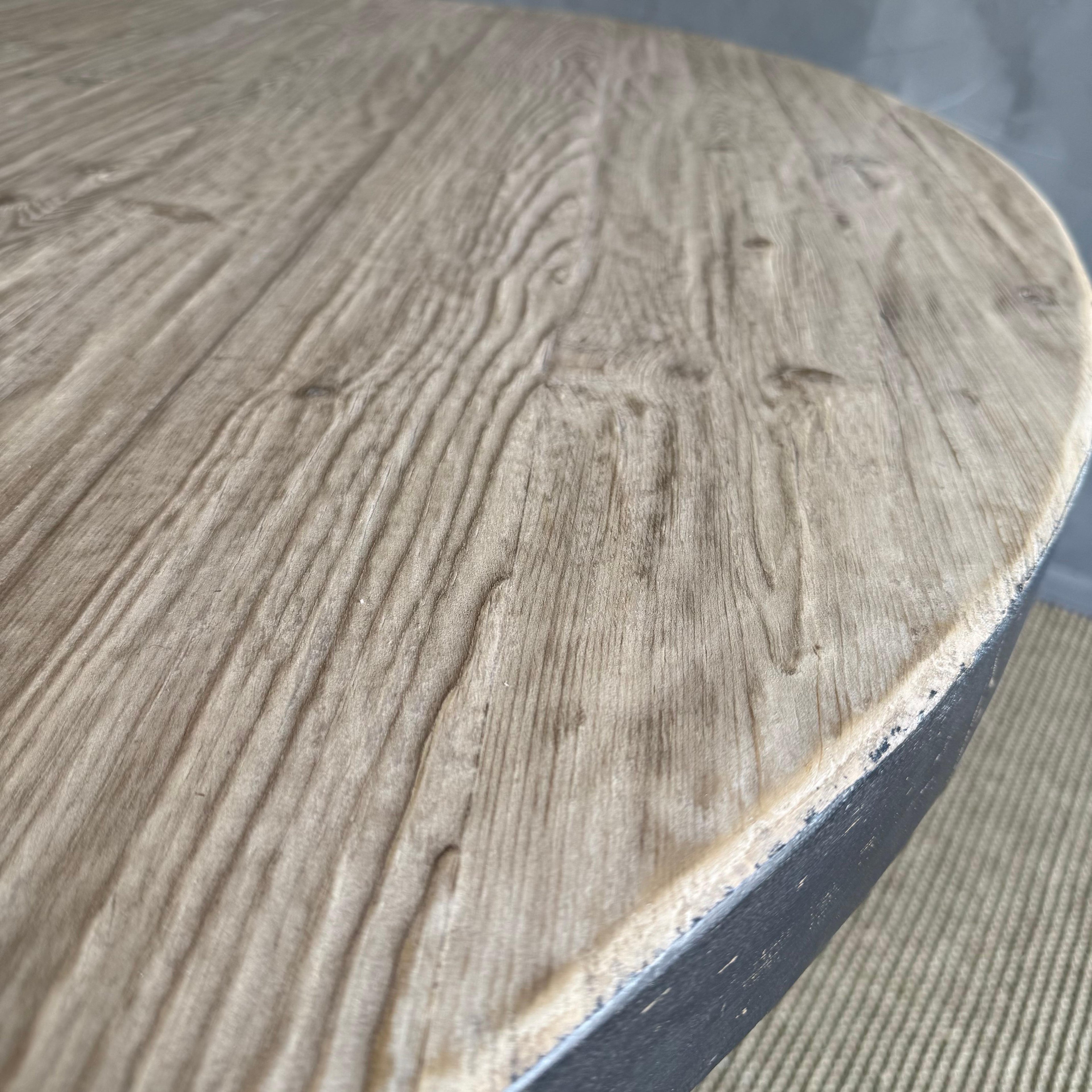 https://a.1stdibscdn.com/reclaimed-pine-wood-60-round-dining-table-with-black-painted-finish-for-sale-picture-13/f_18223/f_459068621752701226160/7L_15_15_master.jpg