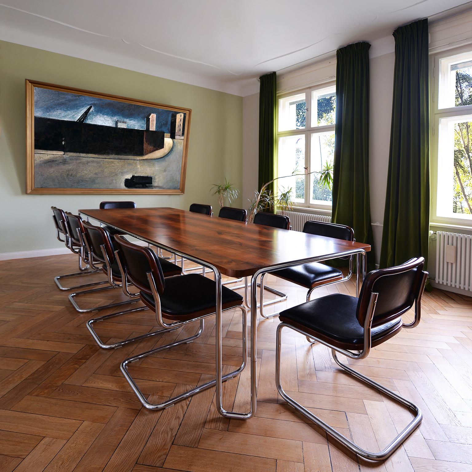 https://a.1stdibscdn.com/modernist-customizable-tubular-steel-table-by-gmd-berlin-veneered-wooden-top-for-sale-picture-8/f_19723/f_271179221643383377753/7_MODERN_XX_GMD_Berlin_Stahlrohr_Schlaufentisch_Tubular_steel_table_master.jpg