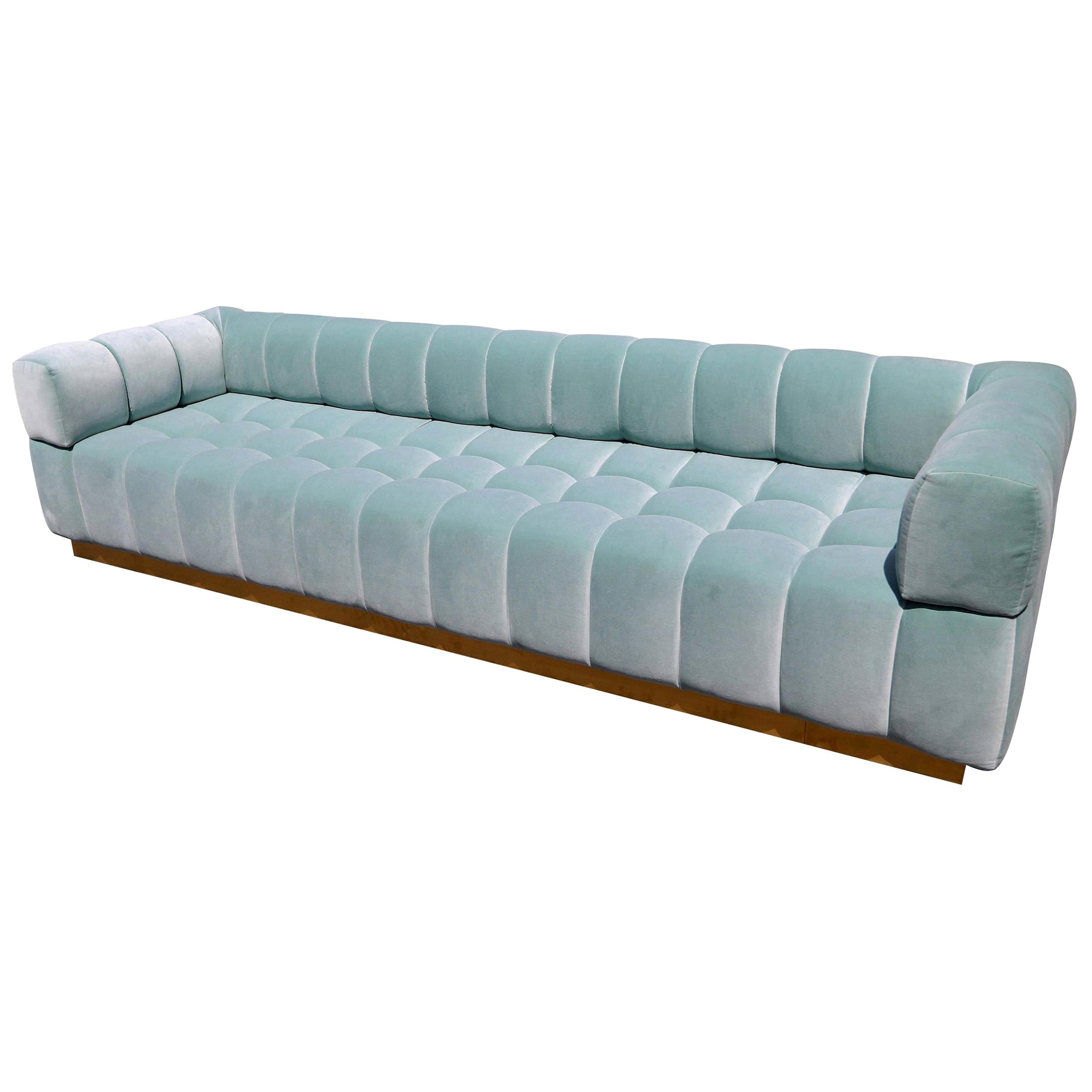 https://a.1stdibscdn.com/custom-tufted-aqua-blue-velvet-sofa-with-brass-base-by-adesso-imports-for-sale/1121189/f_80639231671101978263/8063923_datamatics.jpg