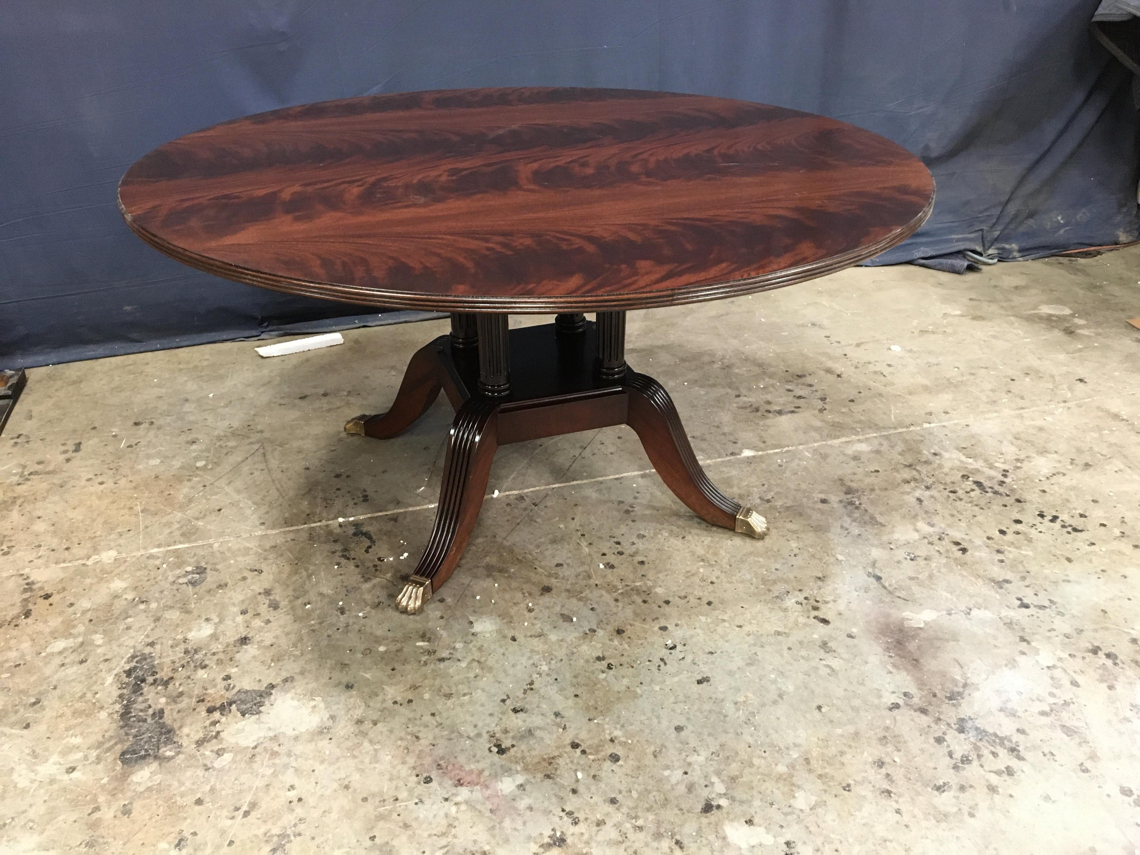 https://a.1stdibscdn.com/round-crotch-mahogany-georgian-style-pedestal-dining-table-by-leighton-hall-for-sale-picture-2/f_44162/f_235522621619554949075/829CF074_FB78_4EF3_83FD_8850B287ED76_master.jpeg