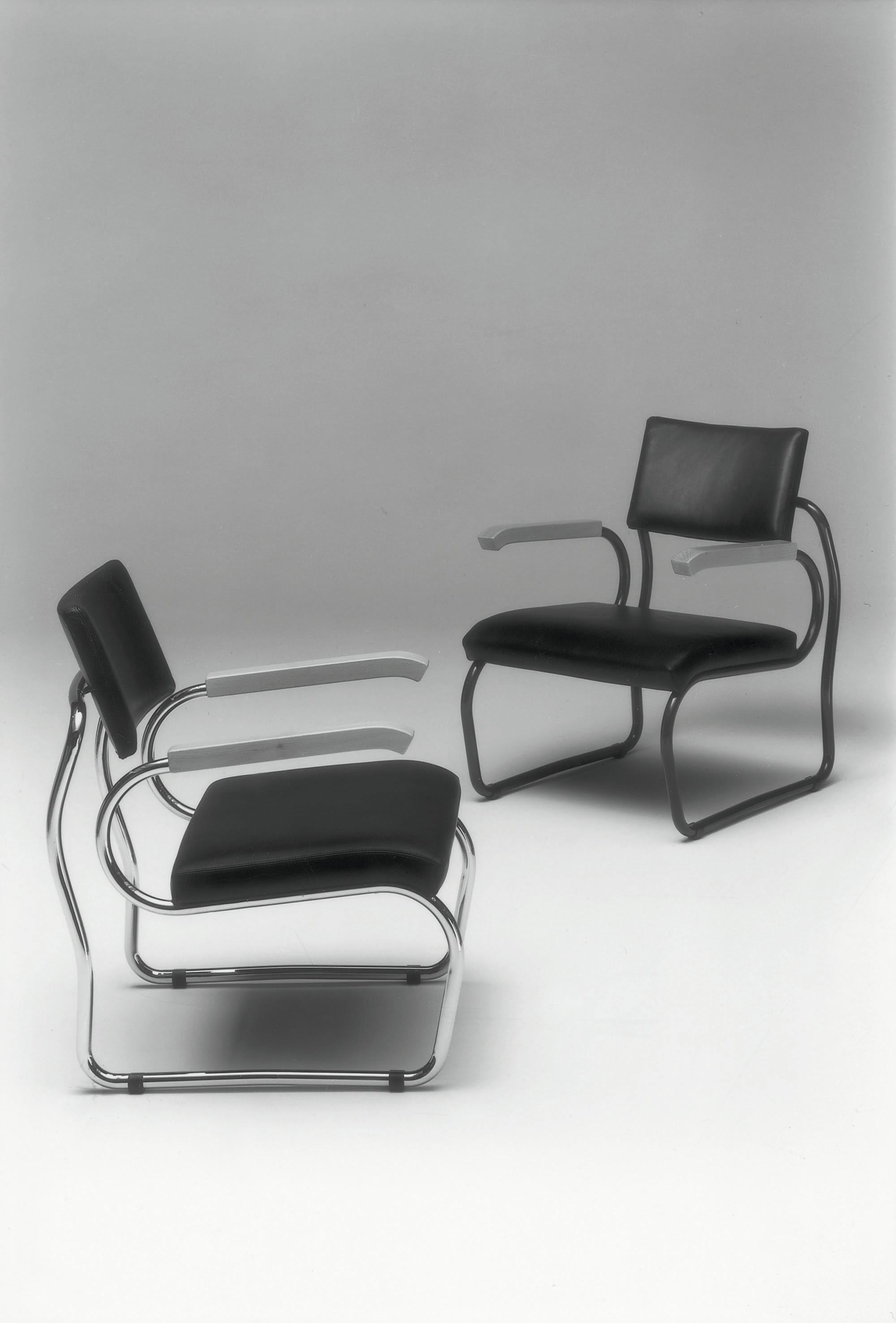 https://a.1stdibscdn.com/zanotta-santelia-armchair-in-black-leather-with-stainless-steel-tubular-frame-for-sale-picture-3/22569652/f_288739621653896566711/850_2IG01_master.jpg