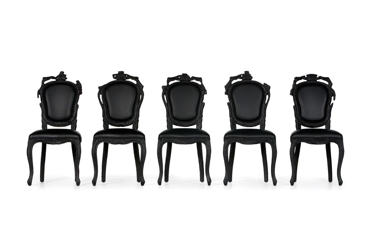 https://a.1stdibscdn.com/moooi-smoke-dining-chair-in-abbracci-black-upholstery-with-burnt-wood-frame-for-sale-picture-2/22569652/f_271124321643366994957/8718282338972_2_master.jpg
