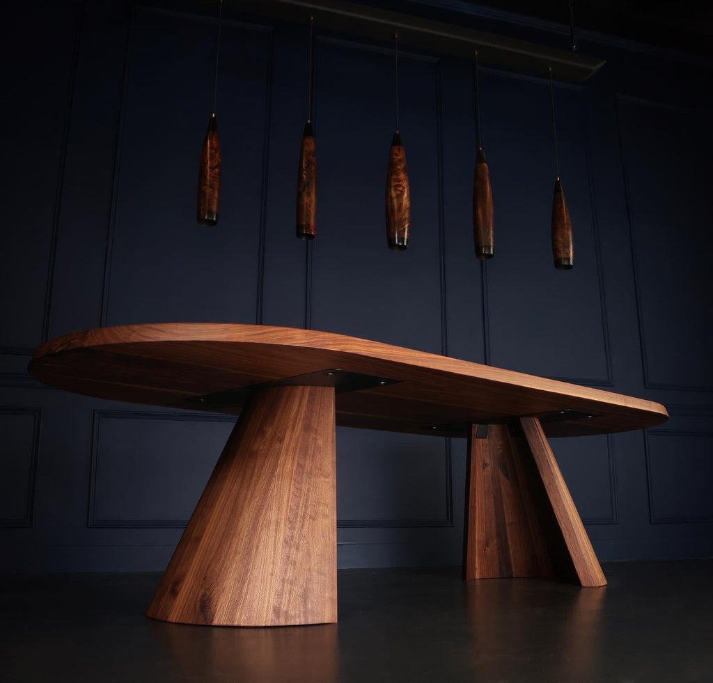 https://a.1stdibscdn.com/solid-walnut-dining-table-turned-cove-base-in-stock-for-sale-picture-5/f_51472/f_248493021628610793779/88BFC23F_531A_447F_AC65_58383C7E9CDC_master.jpeg