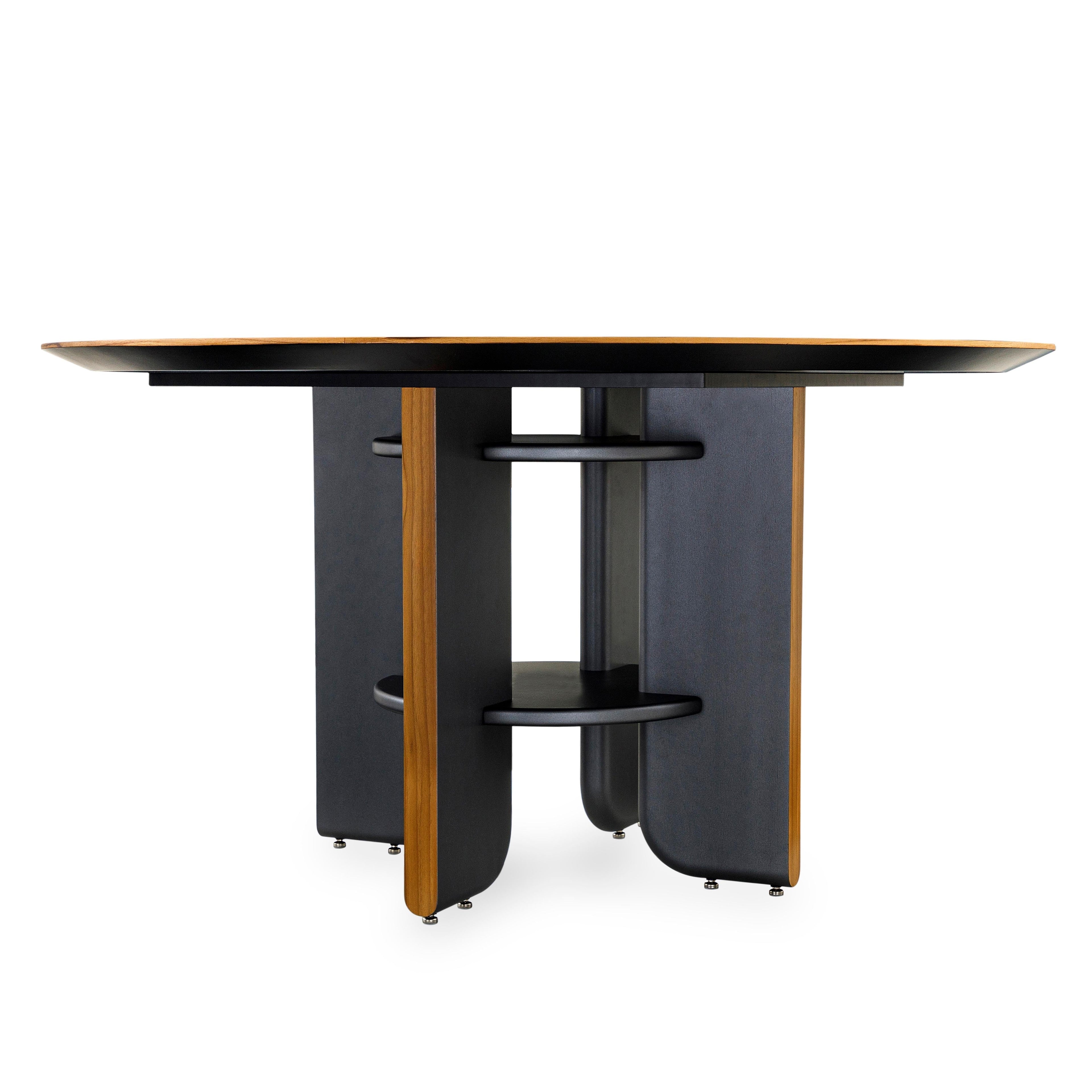 https://a.1stdibscdn.com/moon-55-round-dining-table-with-teak-veneered-top-and-black-wood-legs-for-sale-picture-5/f_52822/f_301862121661795176045/9050_140_TAMPO_LAMINA_148LT077_087TC_148LT_05_master.jpg