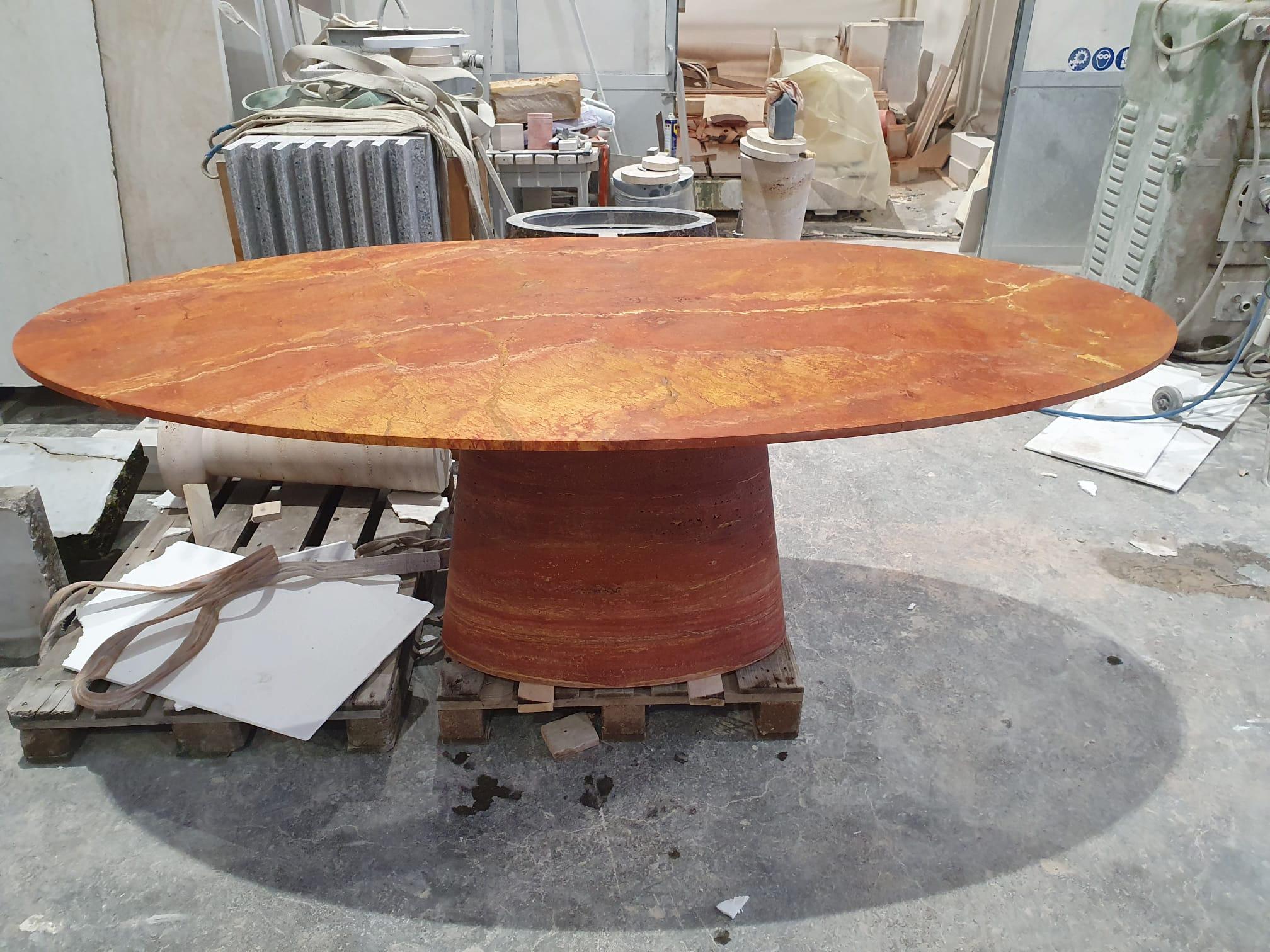 https://a.1stdibscdn.com/made-to-order-red-travertine-dining-table-for-sale-picture-4/f_47872/f_341484921683305992317/927f4607_7687_43b2_87c3_b42f52246c1c_master.jpeg