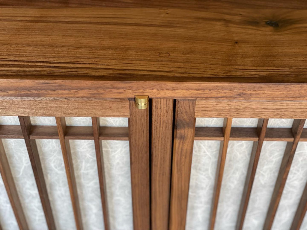 https://a.1stdibscdn.com/walnut-media-cabinet-room-divider-with-shoji-doors-for-sale-picture-3/f_45782/f_291309321655341945688/9A92BB1A_625C_4122_8C70_E91531508C36_master.jpeg