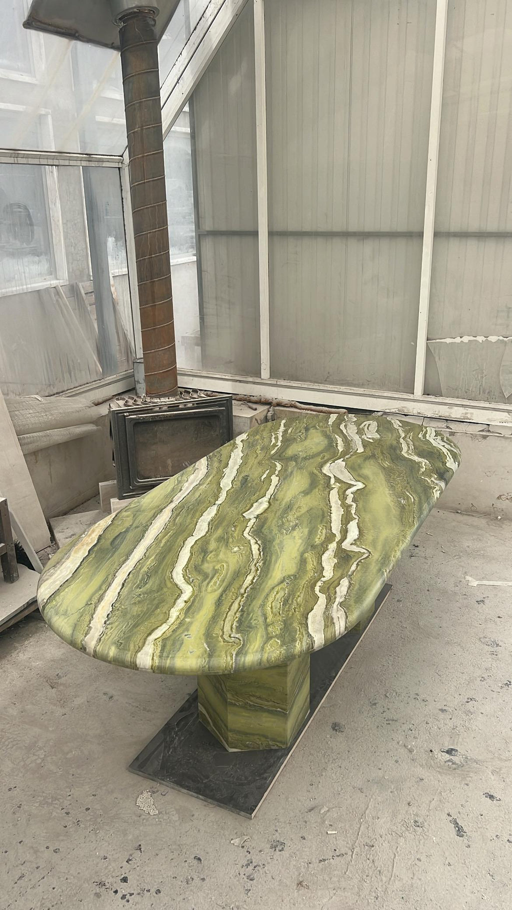 https://a.1stdibscdn.com/large-green-marble-oval-dining-table-by-my-habitat-design-for-sale-picture-6/f_80522/f_400989321717853793599/9C4D5504_8708_42B0_A98C_1C2579D775D9_master.JPG