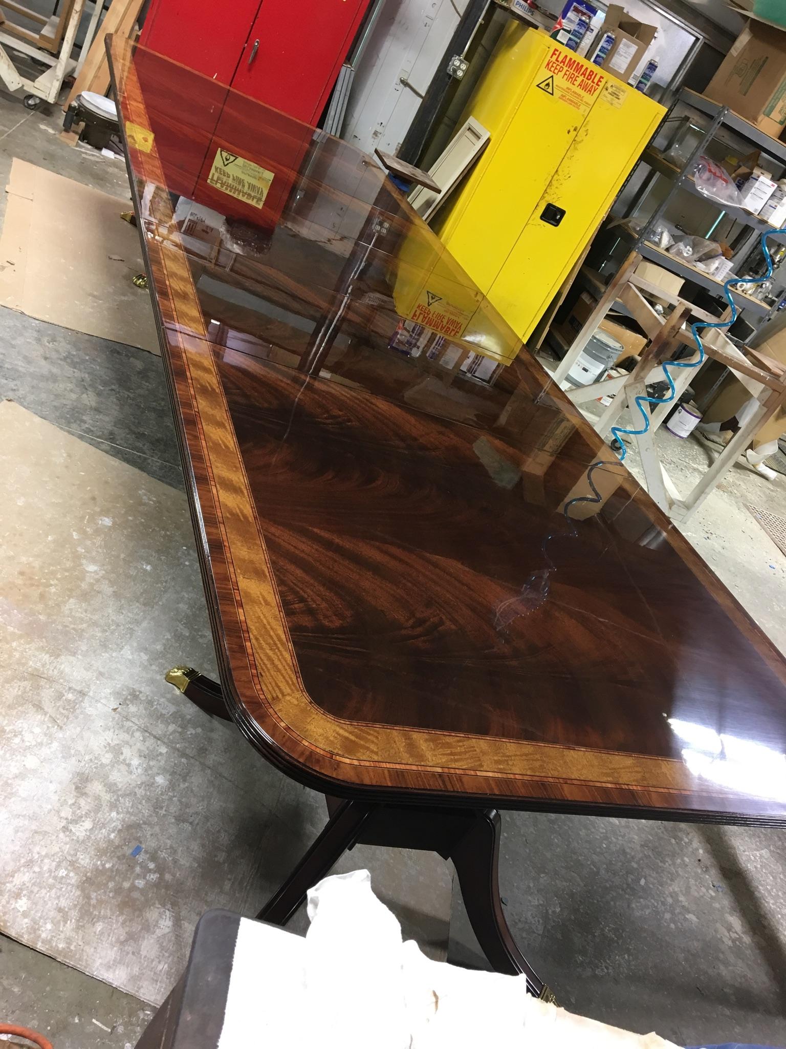 https://a.1stdibscdn.com/large-mahogany-georgian-style-dining-table-by-leighton-hall-for-sale-picture-3/f_44162/f_135421321549111136724/9CE519F5_F836_47FB_B265_BFDD46743E83_master.jpeg