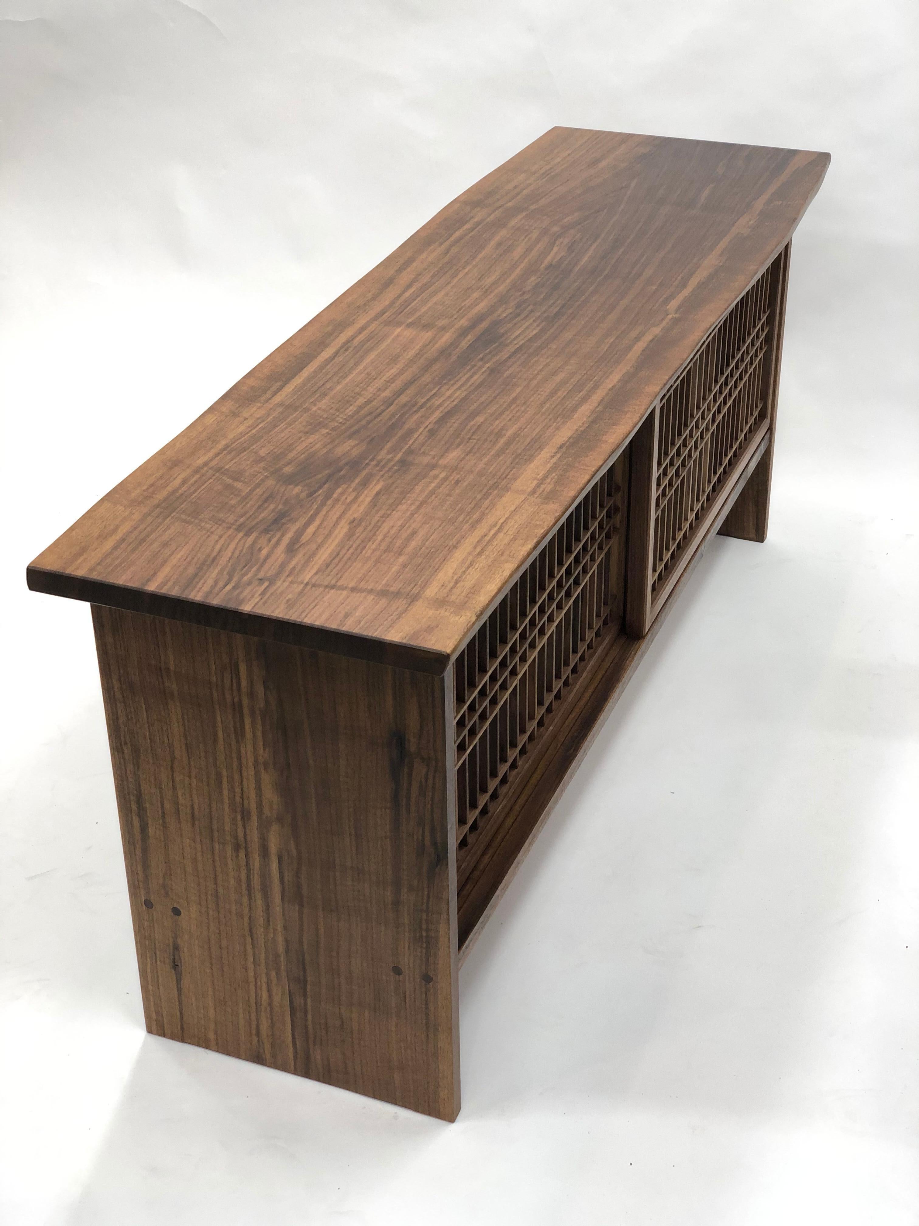 https://a.1stdibscdn.com/walnut-credenza-with-sliding-shoji-doors-for-sale-picture-11/f_45782/f_22445972/A0474CB6_7775_4B33_A026_1612735525093_master.jpeg