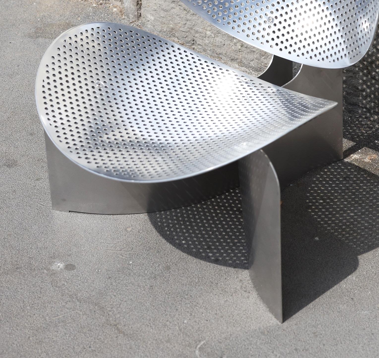 https://a.1stdibscdn.com/r400-perforated-chair-in-silver-polished-aluminum-by-arno-hoogland-for-sale-picture-4/f_12192/f_489596221771950747589/A1F8A4684aa_master.jpg