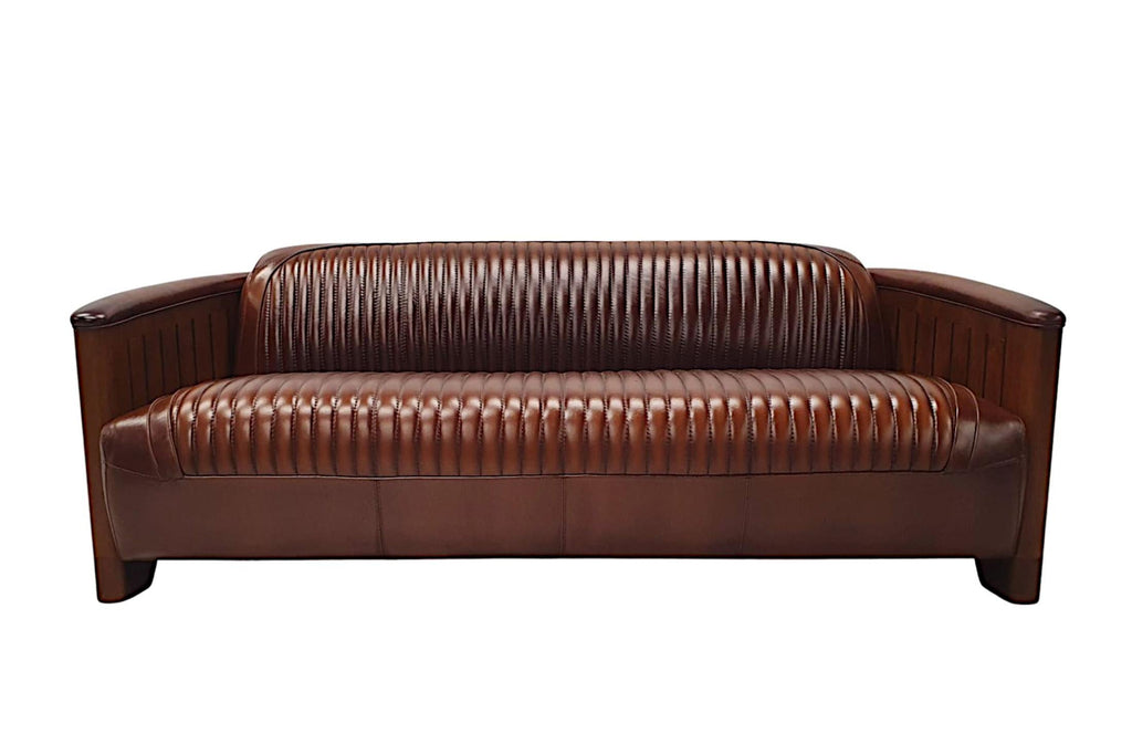 https://a.1stdibscdn.com/a-stunning-three-seater-sofa-in-the-aviator-style-for-sale-picture-2/f_58362/f_320212921672696748886/A2842a_master.jpg