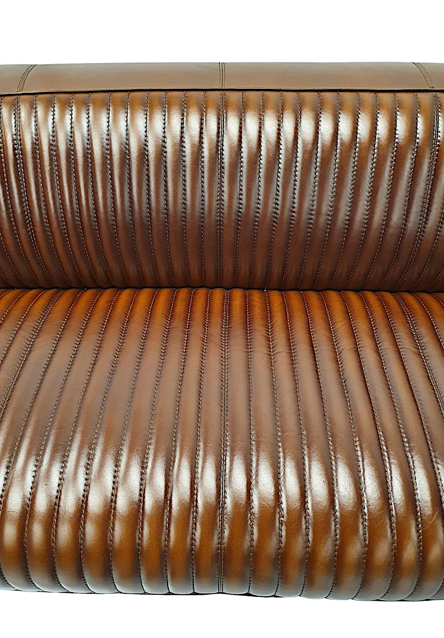 https://a.1stdibscdn.com/a-stunning-three-seater-sofa-in-the-aviator-style-for-sale-picture-3/f_58362/f_320212921672696750201/A2842b_master.jpg