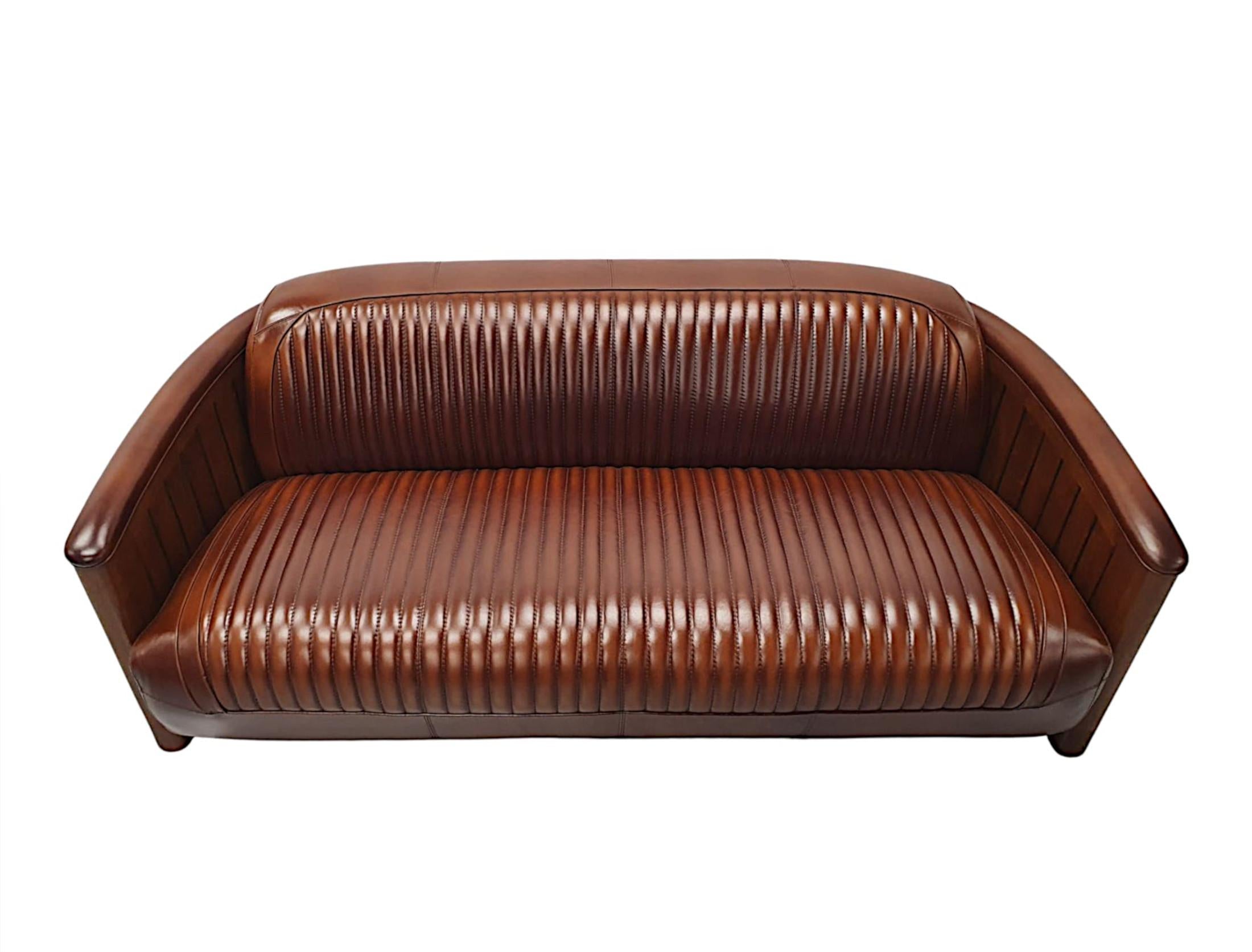 https://a.1stdibscdn.com/a-stunning-three-seater-sofa-in-the-aviator-style-for-sale-picture-4/f_58362/f_320212921672696749095/A2842c_master.jpg