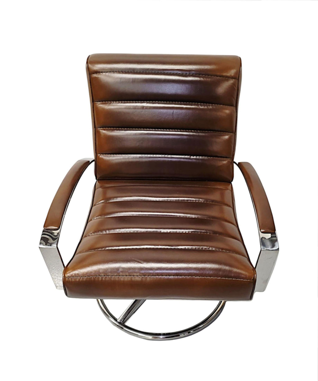 https://a.1stdibscdn.com/a-stunning-mid-century-style-leather-and-chrome-revolving-armchair-for-sale-picture-3/f_58362/f_451718521748102457418/A3991b_master.jpg