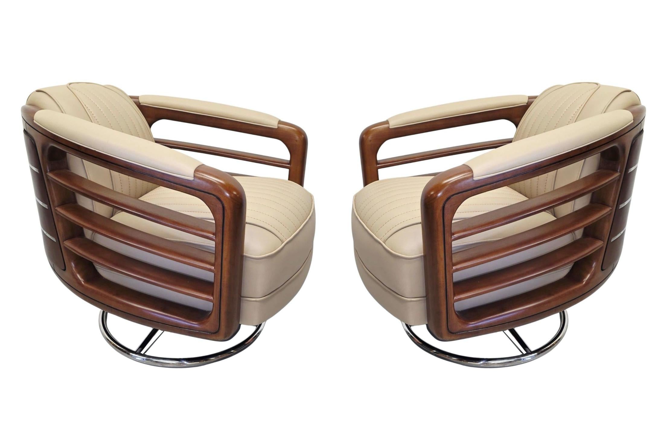 https://a.1stdibscdn.com/a-stunning-handmade-leather-walnut-and-chrome-revolving-armchair-for-sale-picture-2/f_58362/f_463109921755720850876/A4058_Pair_master.jpg