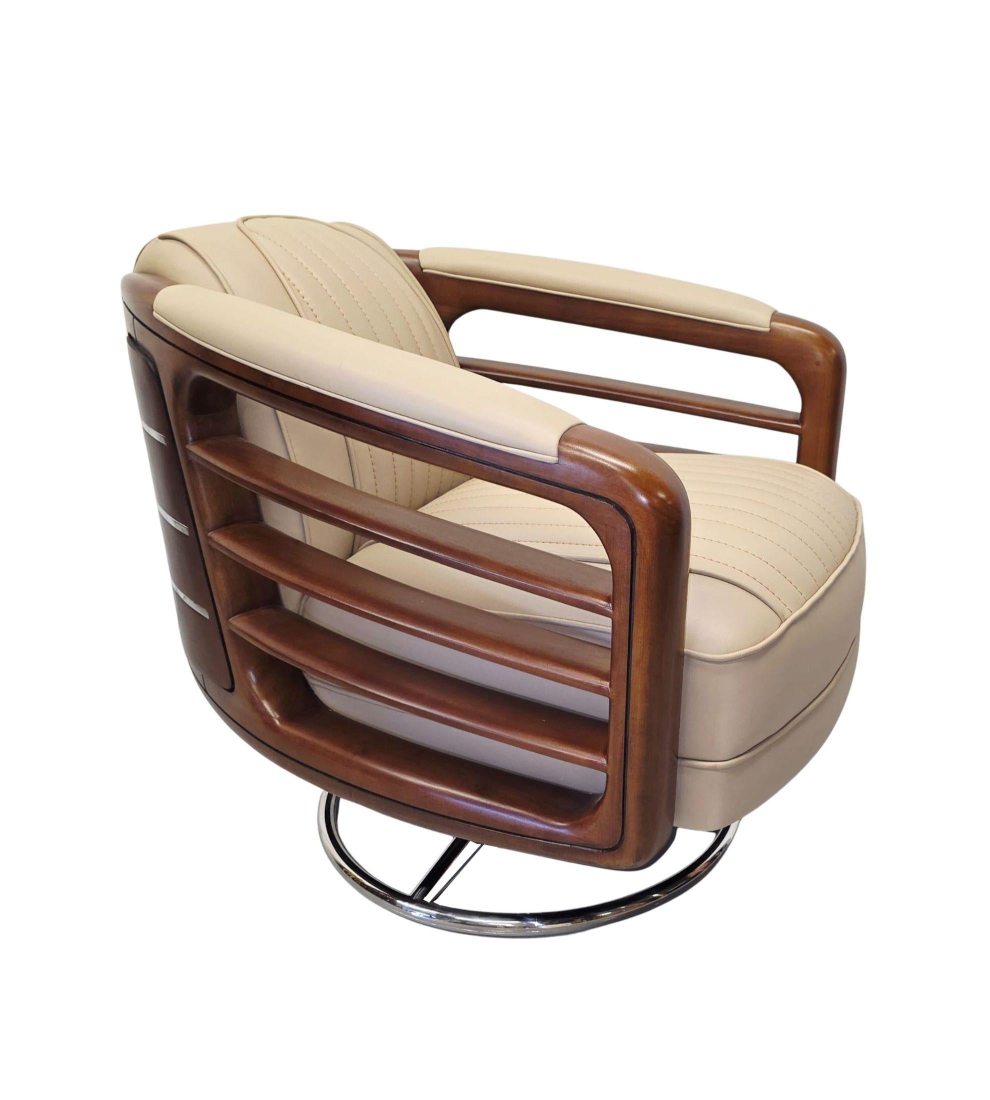 https://a.1stdibscdn.com/a-stunning-handmade-leather-walnut-and-chrome-revolving-armchair-for-sale-picture-2/f_58362/f_463109921755505408678/A4058a_master.jpg