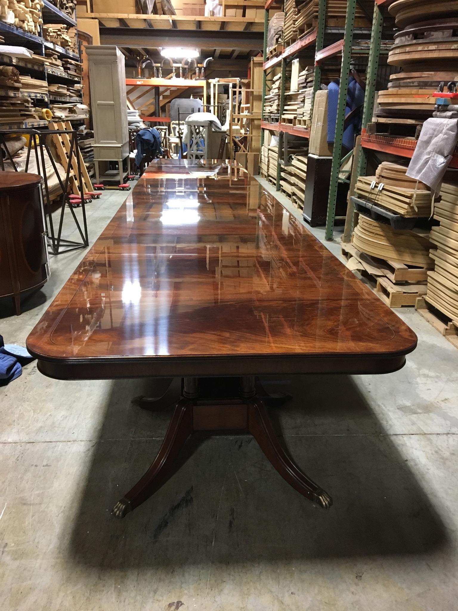 https://a.1stdibscdn.com/large-24-ft-custom-mahogany-georgian-style-dining-table-by-leighton-hall-for-sale-picture-2/f_44162/f_135312021549038886851/A6887A75_EED1_4B16_A483_30D22239F4F5_master.jpeg