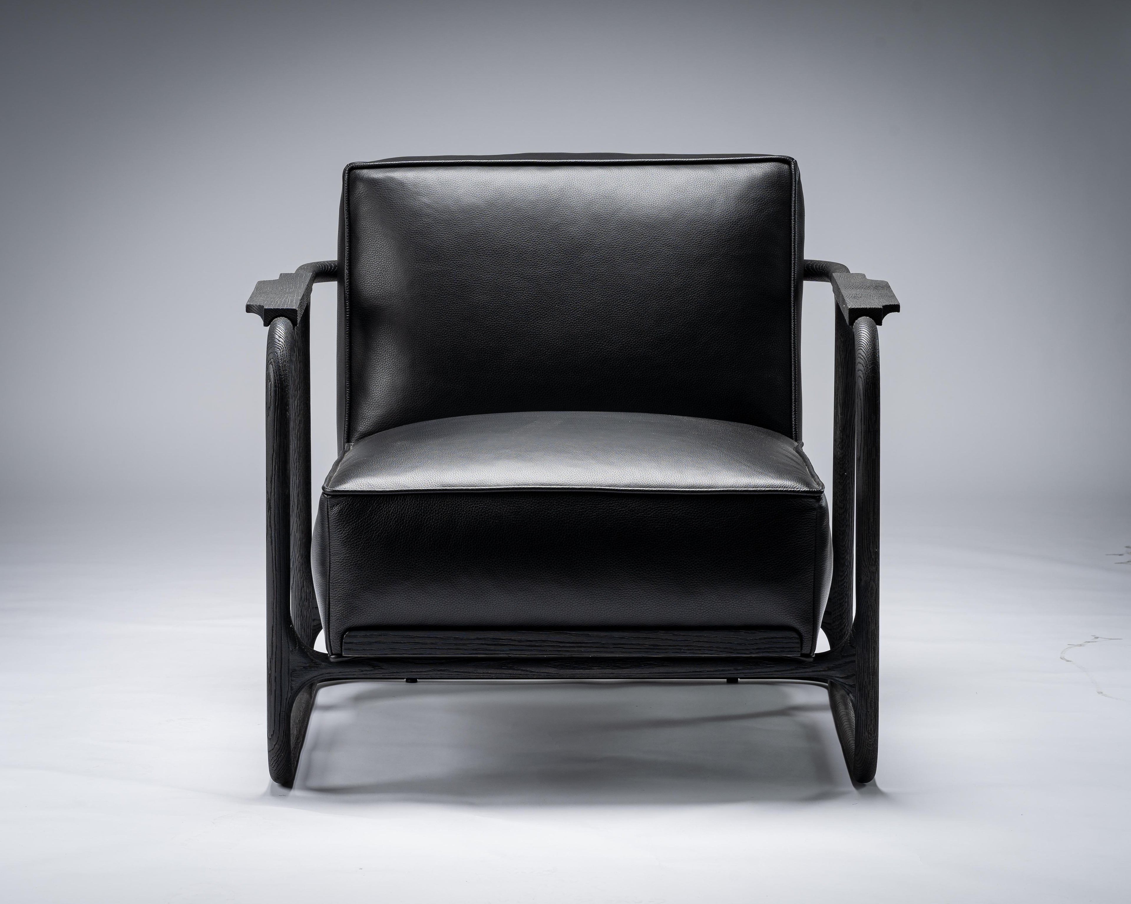 https://a.1stdibscdn.com/alfred-black-lounge-chair-armchair-in-walnut-oak-w-leather-seat-by-mandy-graham-for-sale-picture-2/f_51901/f_193291921594331024500/_A738250_master.jpg