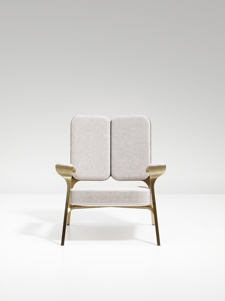 https://a.1stdibscdn.com/upholstered-armchair-with-bronze-patina-brass-details-by-ry-augousti-for-sale-picture-4/f_45491/f_320557621672879475956/ACH08_PFC_3_master.jpg?width=768