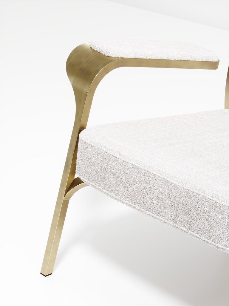 https://a.1stdibscdn.com/upholstered-armchair-with-bronze-patina-brass-details-by-ry-augousti-for-sale-picture-5/f_45491/f_320557621672879476706/ACH08_PFC_8_master.jpg?width=768