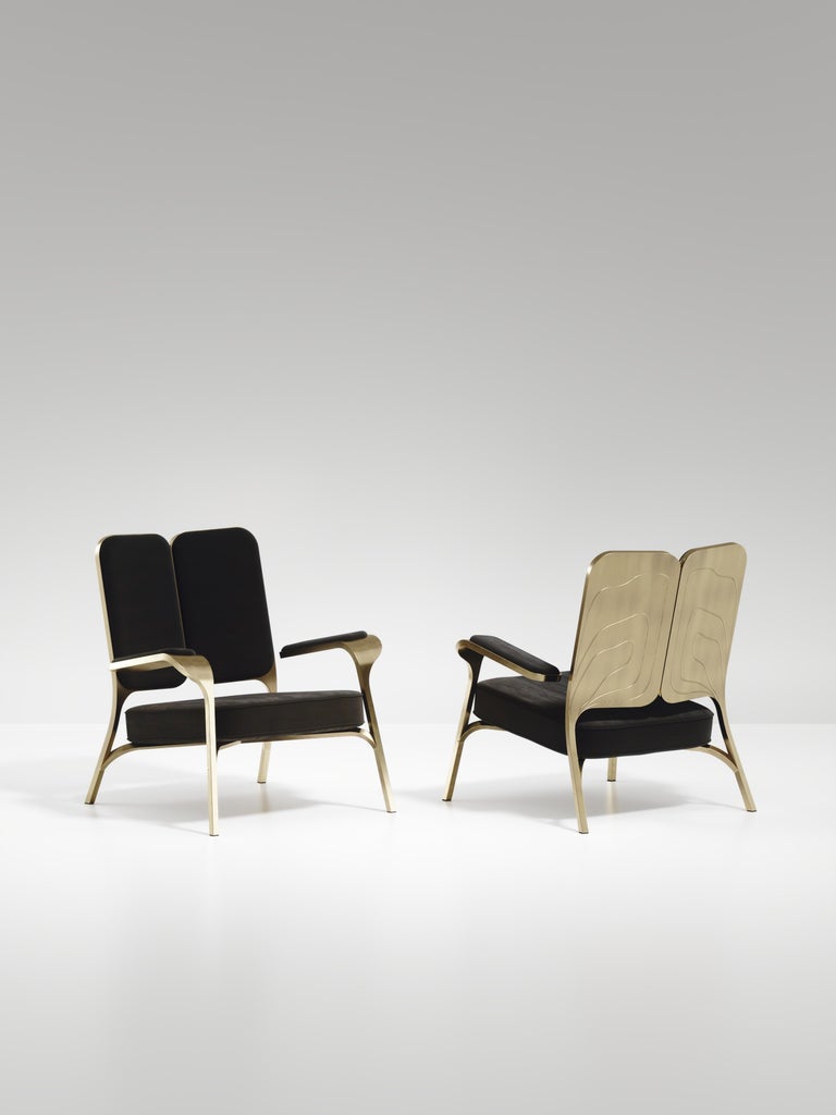 https://a.1stdibscdn.com/upholstered-armchair-with-bronze-patina-brass-details-by-ry-augousti-for-sale-picture-5/f_45491/f_320557121672878905684/ACH08_VL1_4_master.jpg?width=768