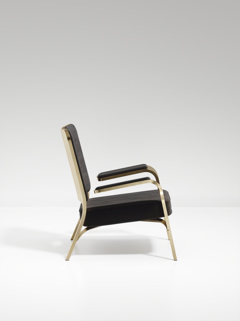 https://a.1stdibscdn.com/upholstered-armchair-with-bronze-patina-brass-details-by-ry-augousti-for-sale-picture-4/f_45491/f_320557121672878906059/ACH08_VL1_7_master.jpg?width=768
