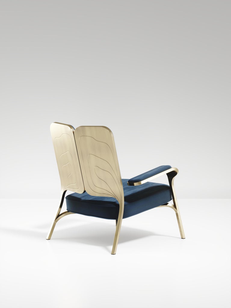 https://a.1stdibscdn.com/upholstered-armchair-with-bronze-patina-brass-details-by-ry-augousti-for-sale-picture-6/f_45491/f_320557621672879477130/ACH08_VL3_2_master.jpg?width=768