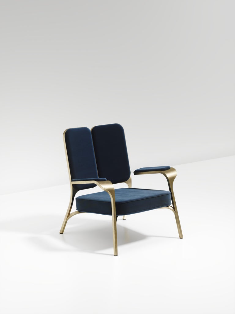 https://a.1stdibscdn.com/upholstered-armchair-with-bronze-patina-brass-details-by-ry-augousti-for-sale-picture-8/f_45491/f_320557621672879477890/ACH08_VL3_5_master.jpg?width=768