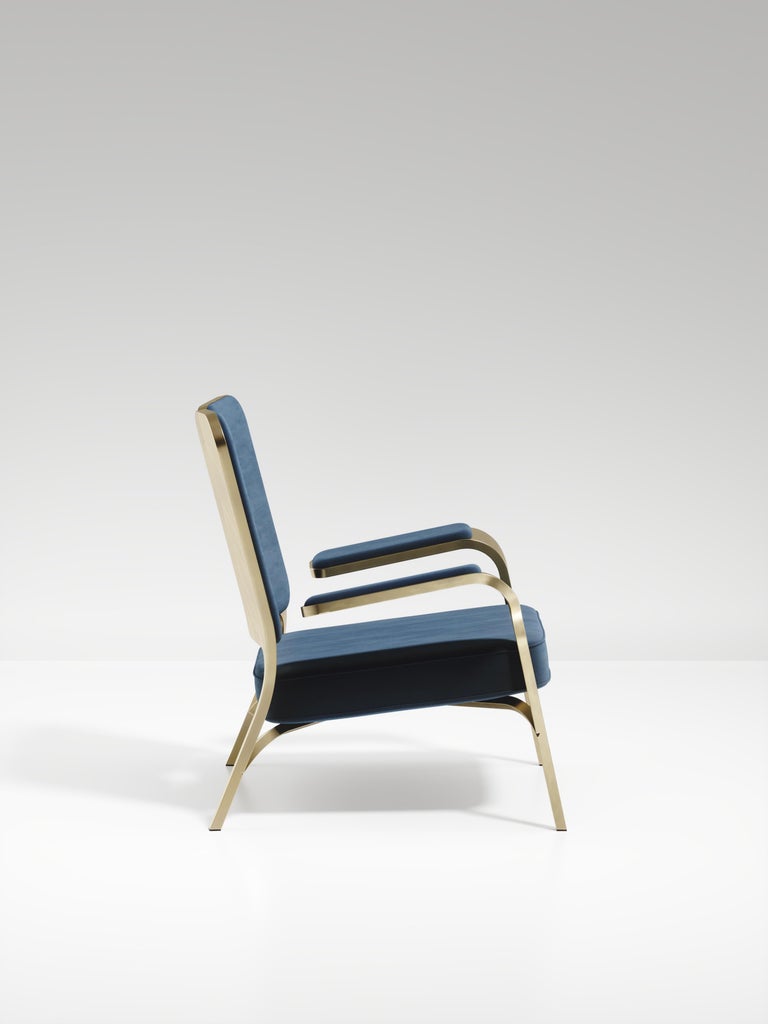 https://a.1stdibscdn.com/upholstered-armchair-with-bronze-patina-brass-details-by-ry-augousti-for-sale-picture-10/f_45491/f_320557621672879478719/ACH08_VL3_7_master.jpg?width=768