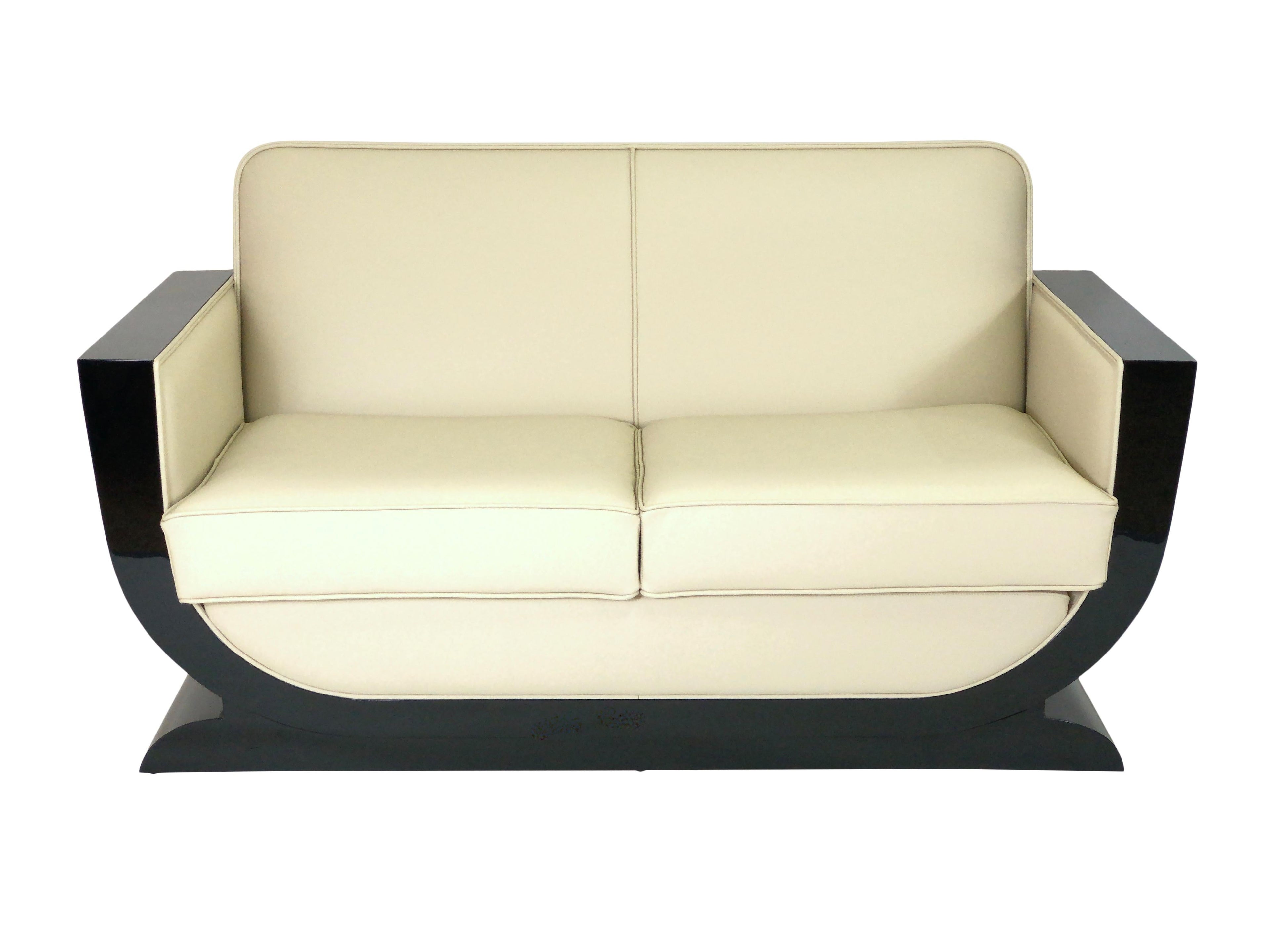 https://a.1stdibscdn.com/u-shaped-black-and-white-art-deco-style-couch-with-black-piano-lacquer-for-sale-picture-2/f_31283/f_192042621590412457622/ADM0099_Art_Deco_Stil_M_bel_Sofa_zweisitzer_Leder_Schwarzlack_beige_Made_in_Germany_02_master.jpeg