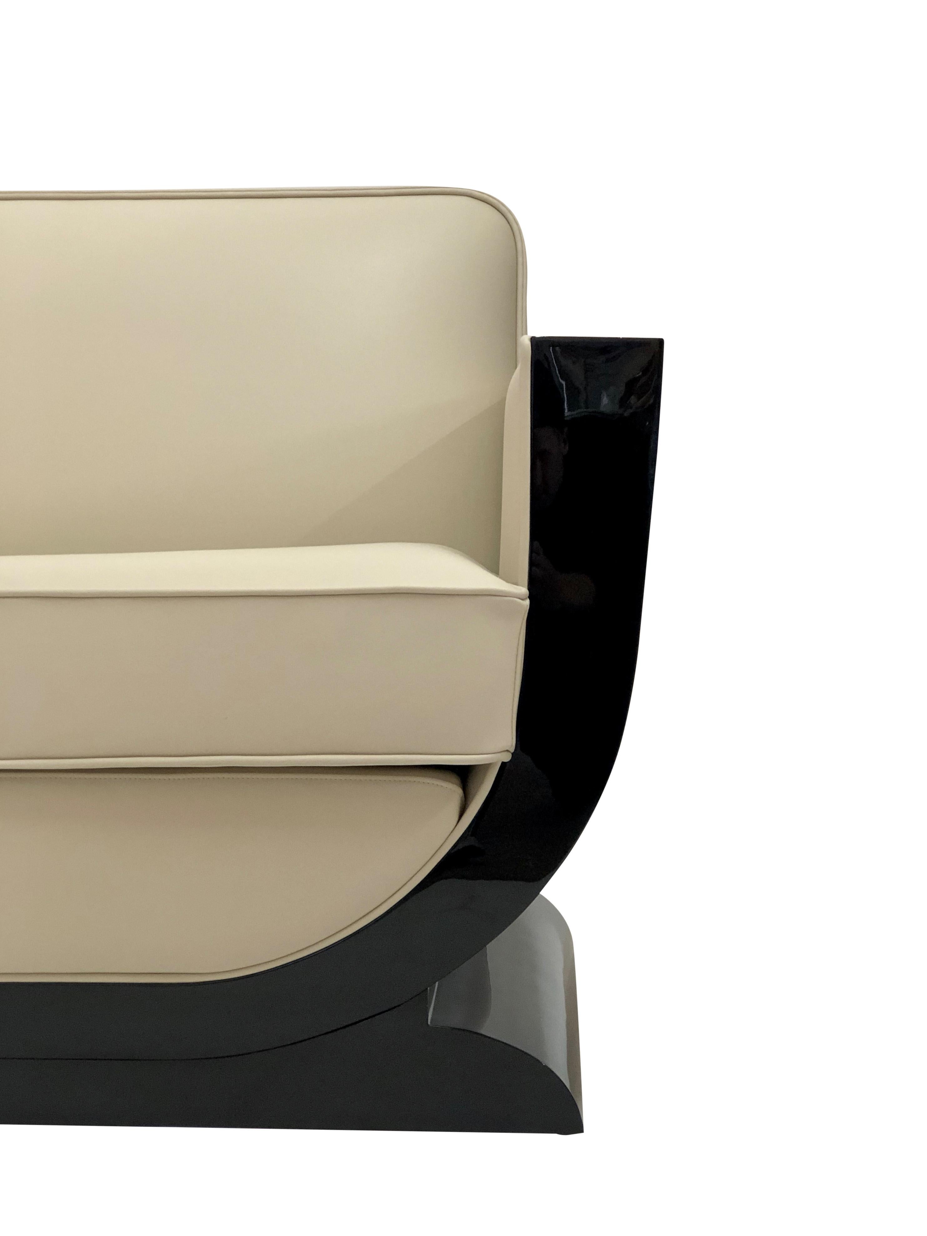 https://a.1stdibscdn.com/u-shaped-black-and-white-art-deco-style-couch-with-black-piano-lacquer-for-sale-picture-4/f_31283/f_192042621590412483694/ADM0099_Art_Deco_Stil_M_bel_Sofa_zweisitzer_Leder_Schwarzlack_beige_Made_in_Germany_03_master.jpeg
