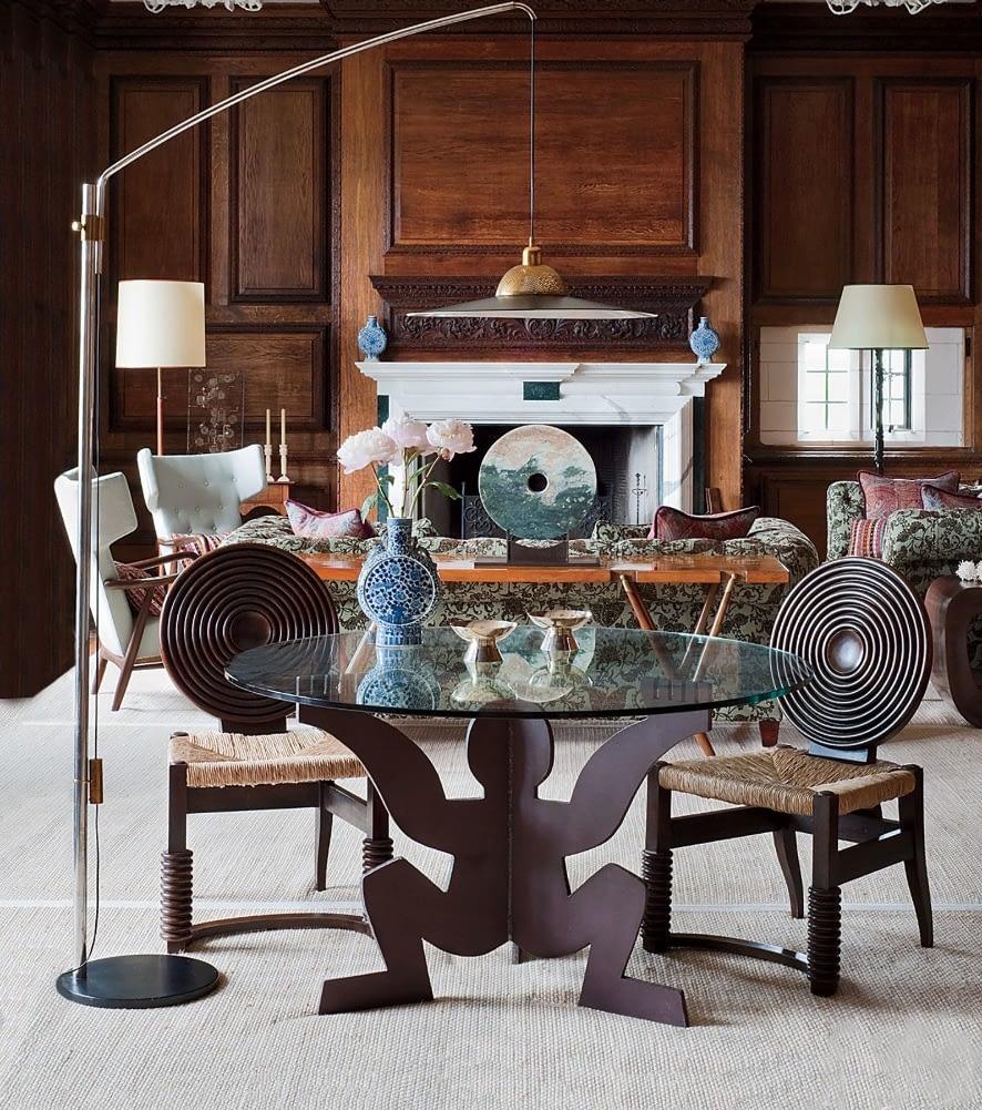 https://a.1stdibscdn.com/modern-maurizio-cattelan-for-dilmos-round-dining-table-crude-iron-glass-for-sale-picture-6/f_55232/f_219087921608730192209/AD_cerberino_per_sito_master.jpg