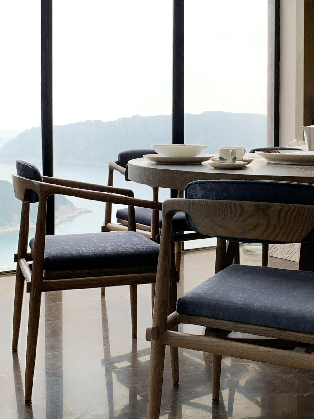 https://a.1stdibscdn.com/round-dining-table-with-lazy-susan-160cm-interlock-andre-fu-living-grey-oak-new-for-sale-picture-5/f_52392/f_188961521588237497055/AFL_Collection_AB_MV_Mood_Image_18_master.jpg