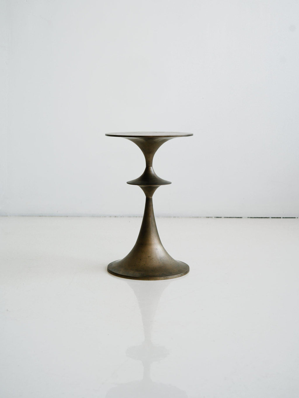 https://a.1stdibscdn.com/umaid-table-in-cast-brass-small-for-sale-picture-9/f_71162/f_307669221685628638670/AKMD_21157_master.jpg