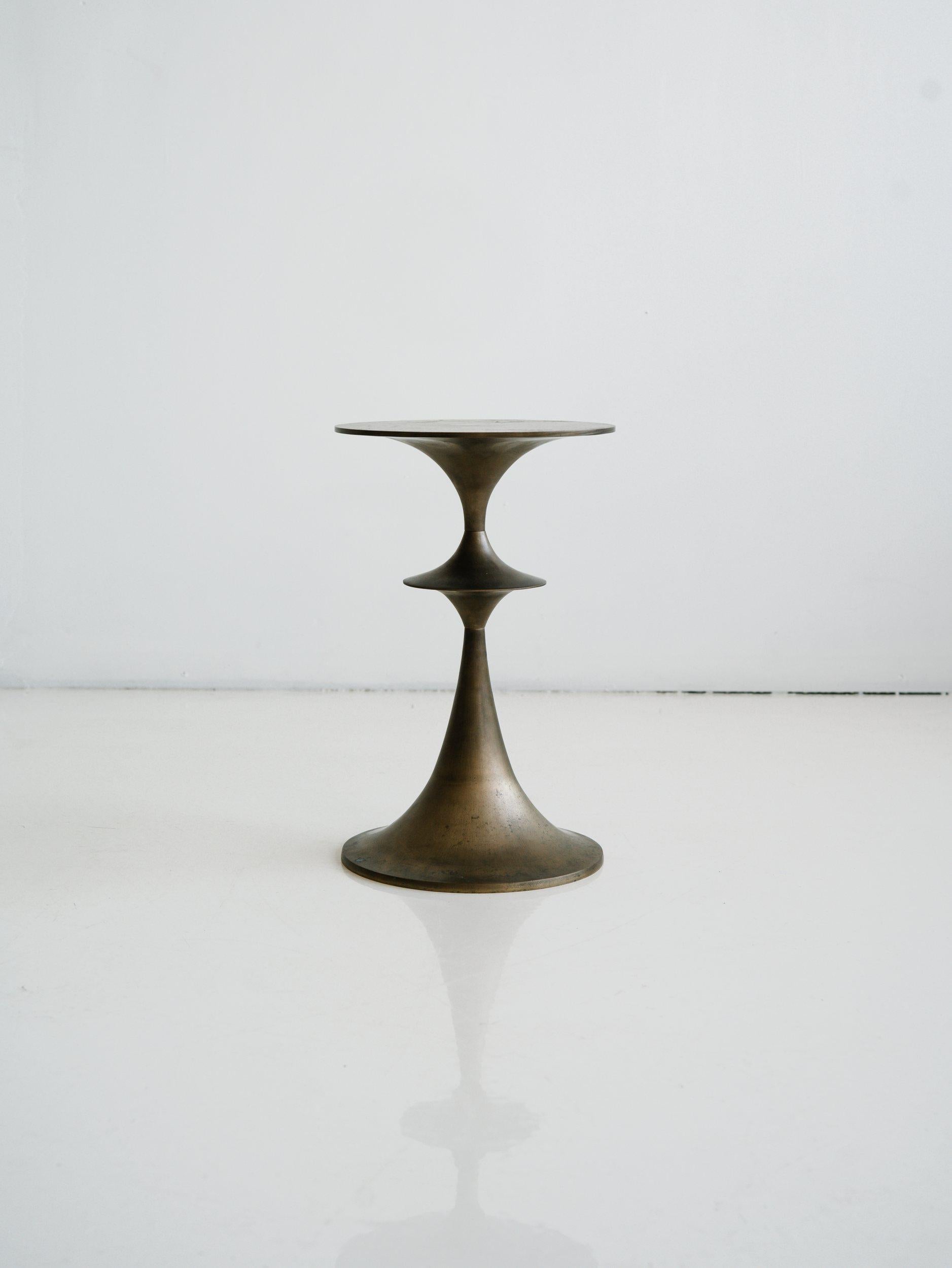 https://a.1stdibscdn.com/umaid-table-in-cast-brass-small-for-sale-picture-9/f_71162/f_307669221685628638670/AKMD_21157_master.jpg