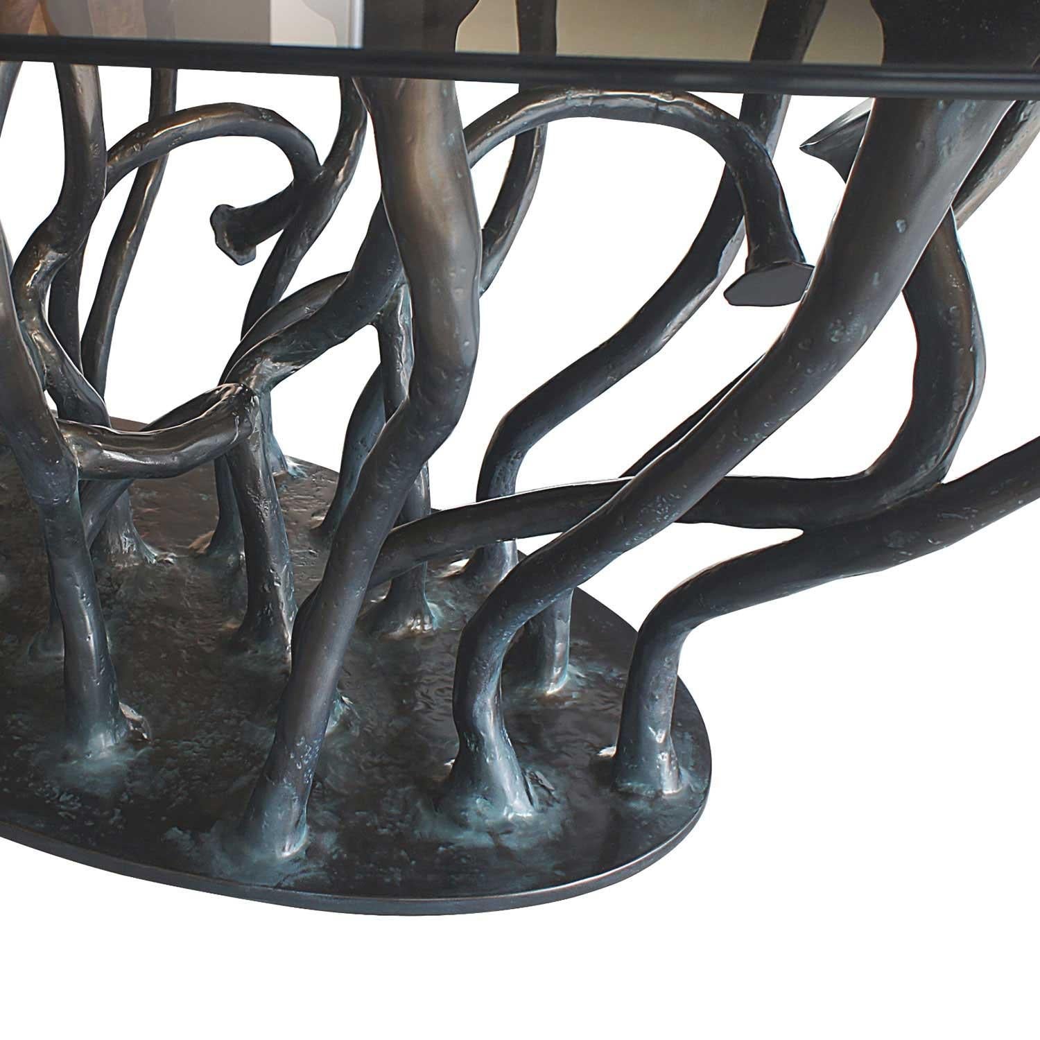 https://a.1stdibscdn.com/in-stock-amorphous-dining-table-bronze-finish-for-sale-picture-2/f_27693/f_317044821670885489572/ALLANA_Esstisch_Fiberglasfuss_KARPA_DESSAIVE_Selected_Interior_Design_master.jpg