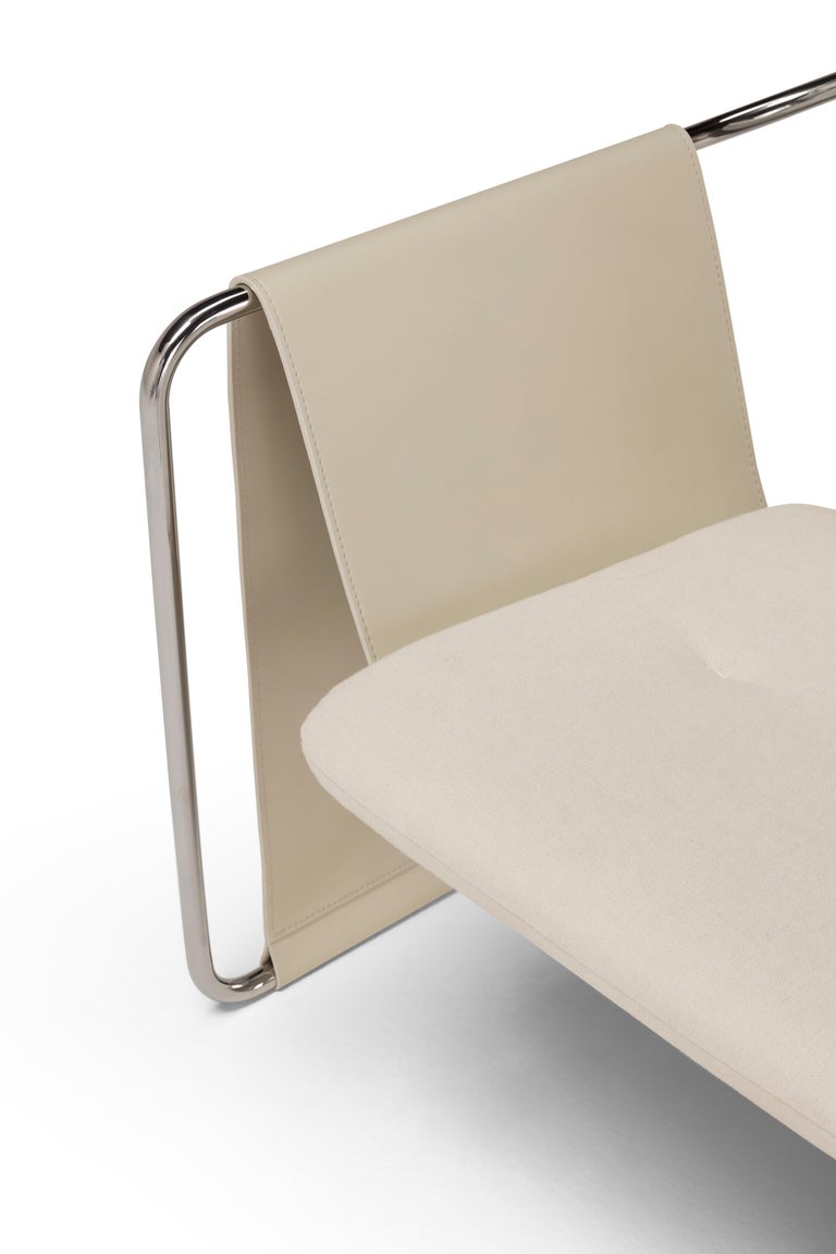 https://a.1stdibscdn.com/contemporary-armchair-kimono-beige-fabric-leather-chrome-steel-for-sale-picture-14/f_31233/f_443500821743611561805/AM010_010_Fibris03_cuoio08_Lucido_6_master.jpg?width=768