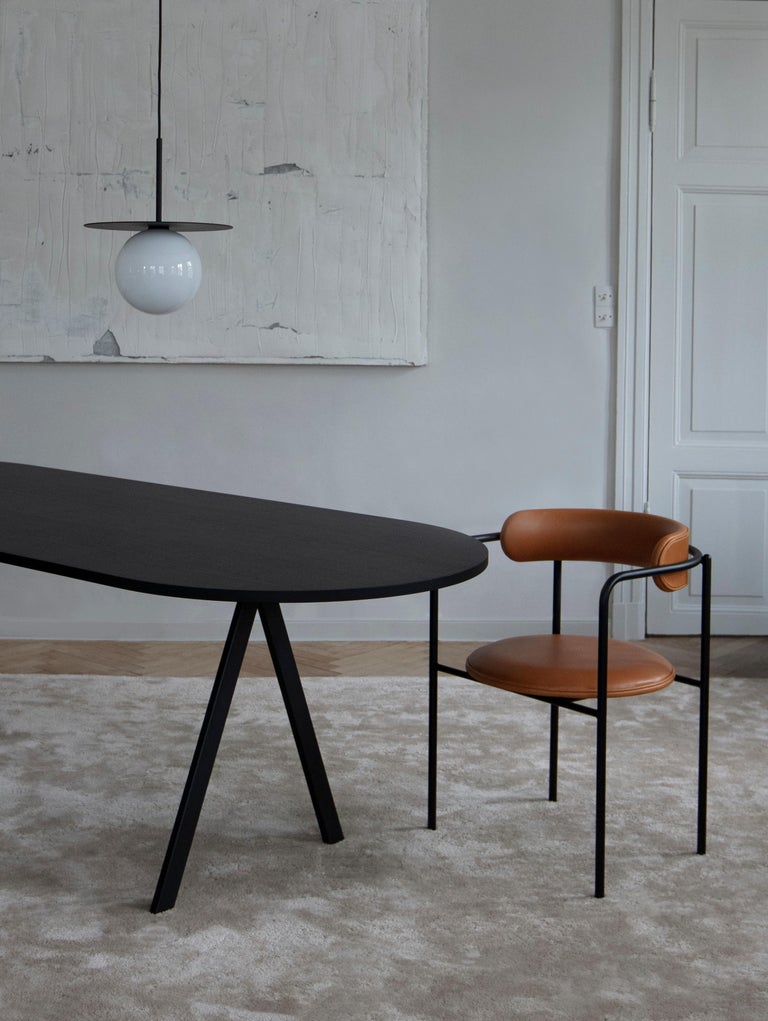 https://a.1stdibscdn.com/contemporary-chair-ff-4-legs-boucle-fabric-black-legs-for-sale-picture-4/f_31233/f_228122021614961538893/AMBIENT_86_2_master.jpg?width=768