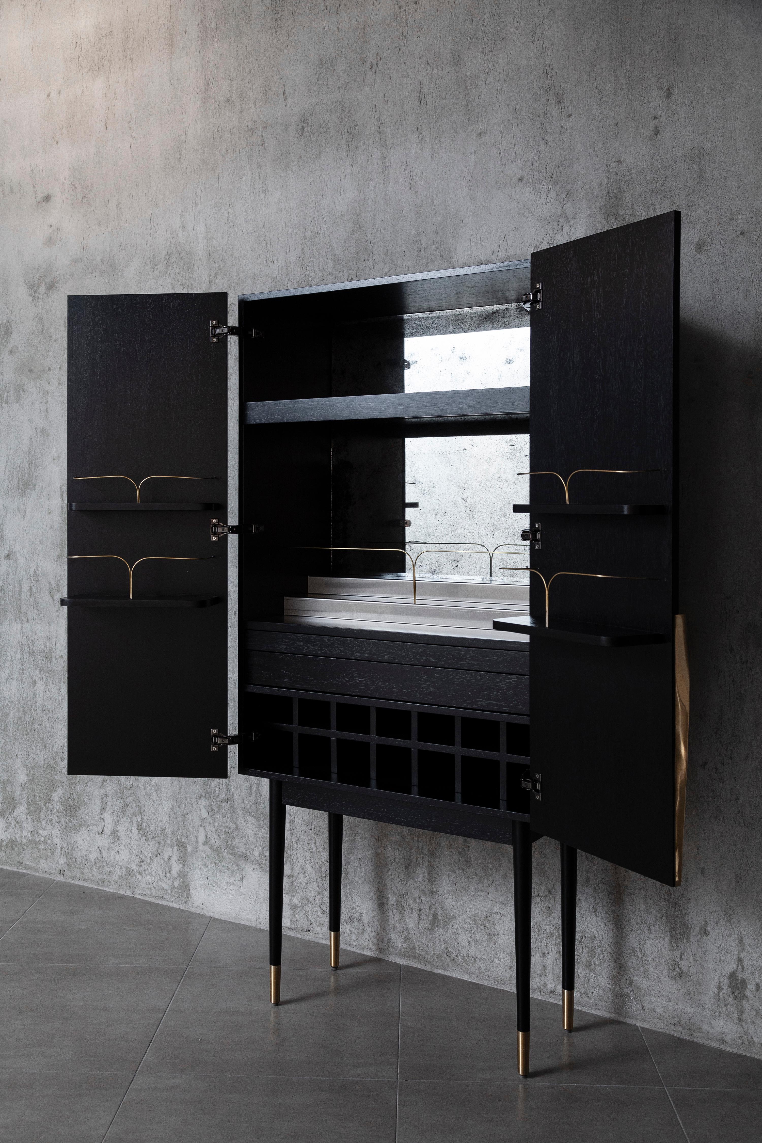 https://a.1stdibscdn.com/perfidia-bar-cabinet-in-solid-wood-with-cast-bronze-details-by-estudio-andean-for-sale-picture-13/f_12192/f_468811321759325745320/ANDEAN_APERACC01_07_CHRISFALCONY_master.jpg