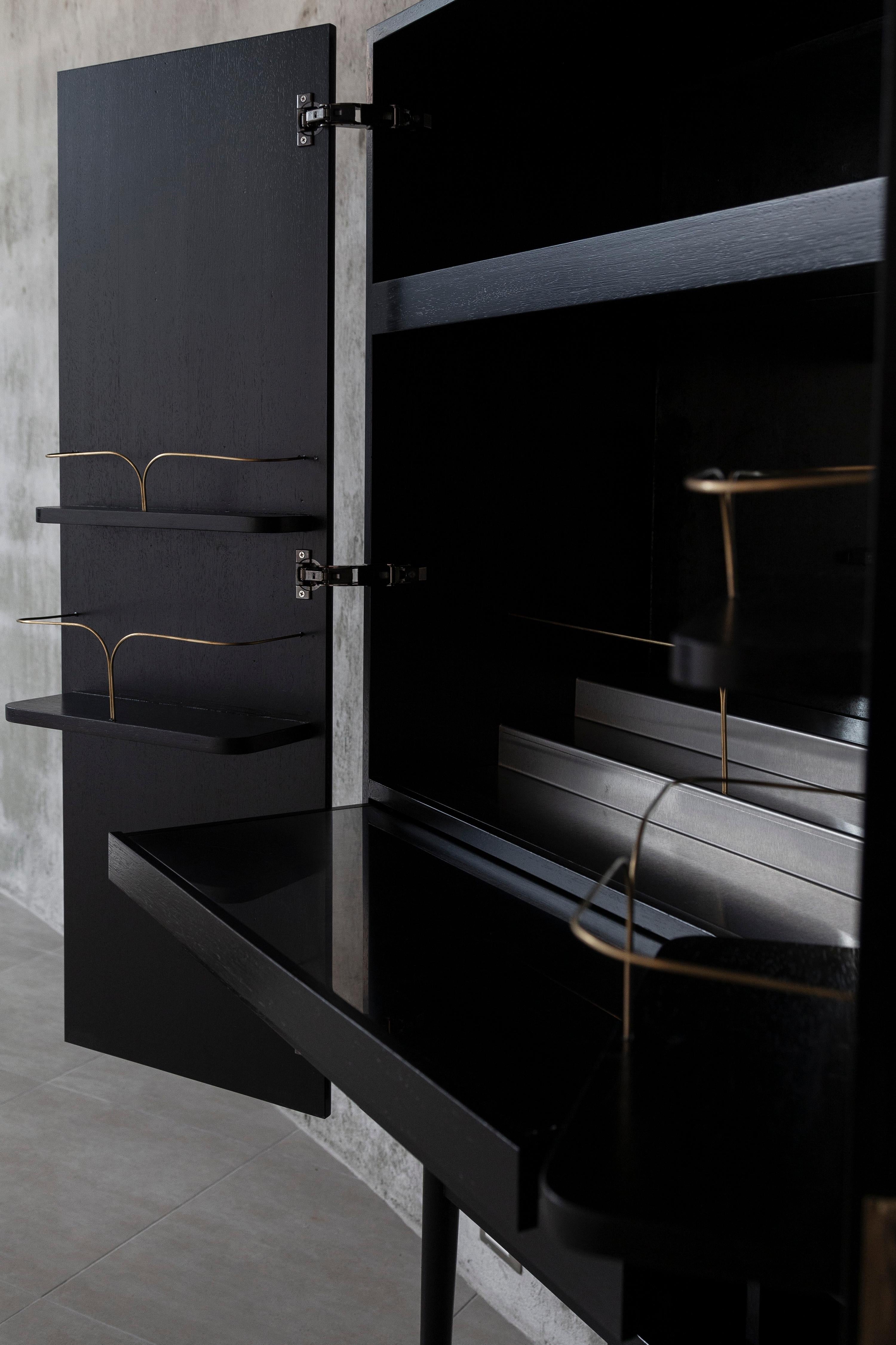 https://a.1stdibscdn.com/perfidia-bar-cabinet-in-solid-wood-with-cast-bronze-details-by-estudio-andean-for-sale-picture-5/f_12192/f_468811321759325683462/ANDEAN_APERACC01_09_CHRISFALCONY_master.jpg