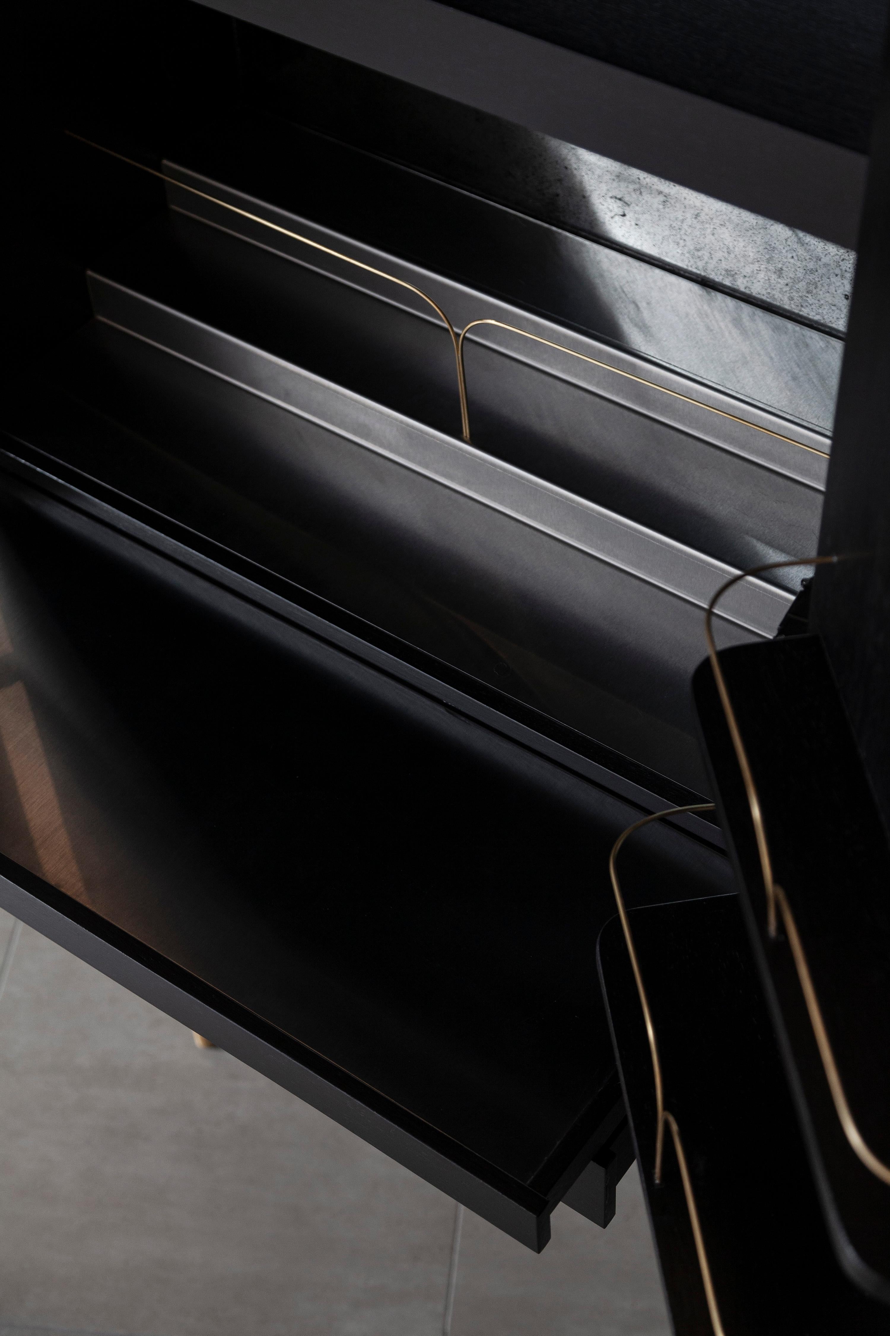 https://a.1stdibscdn.com/perfidia-bar-cabinet-in-solid-wood-with-cast-bronze-details-by-estudio-andean-for-sale-picture-6/f_12192/f_468811321759325683513/ANDEAN_APERACC01_10_CHRISFALCONY_master.jpg