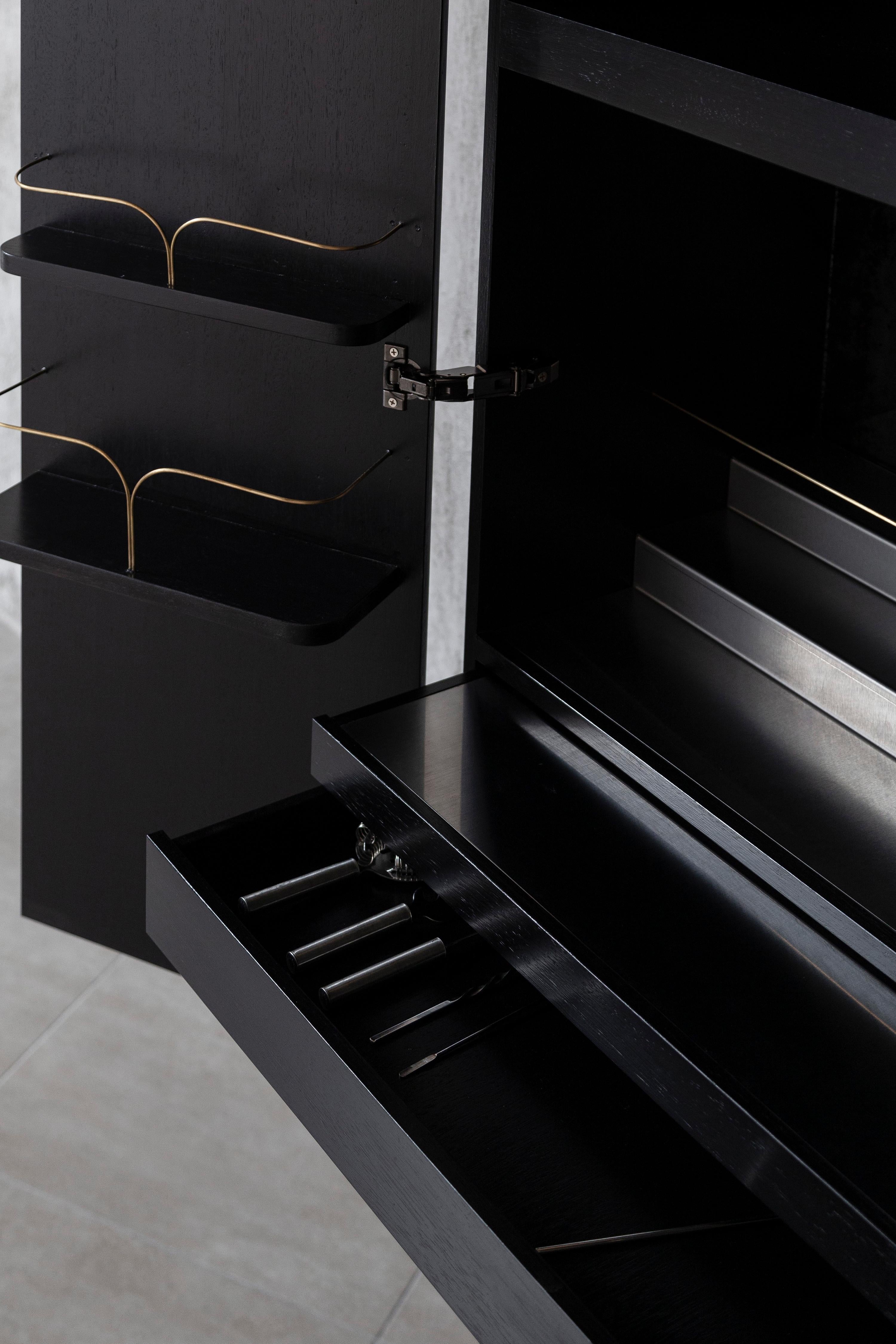 https://a.1stdibscdn.com/perfidia-bar-cabinet-in-solid-wood-with-cast-bronze-details-by-estudio-andean-for-sale-picture-8/f_12192/f_468811321759325687971/ANDEAN_APERACC01_12_CHRISFALCONY_master.jpg