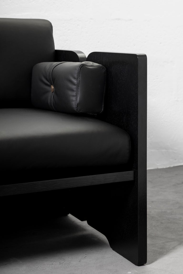 https://a.1stdibscdn.com/perfidia-3-seater-sofa-in-ebano-wood-leather-aged-brass-by-estudio-andean-for-sale-picture-5/f_12192/f_468714421759251699707/ANDEAN_APERASU02K_12_CHRISFALCONY_1__master.jpg?width=768