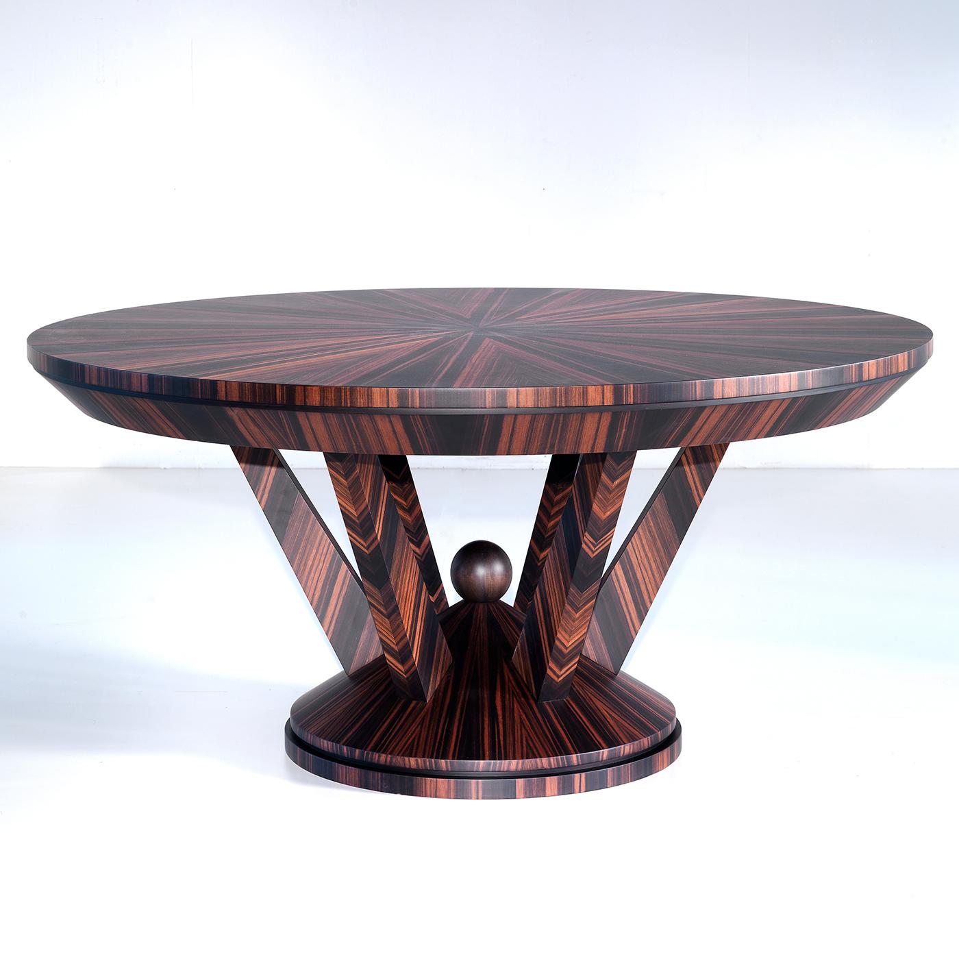 https://a.1stdibscdn.com/ebony-round-dining-table-for-sale-picture-2/22569652/f_223027921611815555132/ANNICO_120_A20200803_24_1y7rf5u_master.jpg