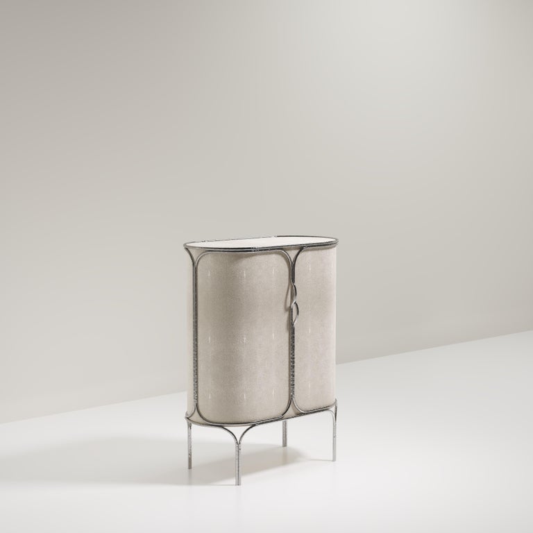 https://a.1stdibscdn.com/shagreen-bar-cabinet-with-chrome-finish-stainless-steel-details-by-ry-augousti-for-sale-picture-2/f_45491/f_359495521693446878700/ARIANE_BAR_D10000_master.jpg?width=768