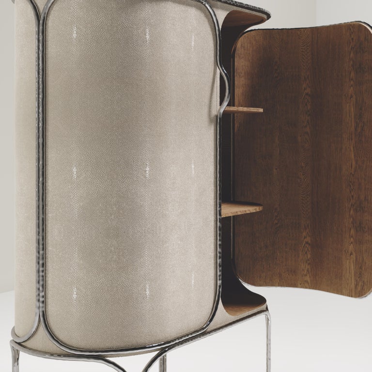 https://a.1stdibscdn.com/shagreen-bar-cabinet-with-chrome-finish-stainless-steel-details-by-ry-augousti-for-sale-picture-6/f_45491/f_359495521693450581487/ARIANE_BAR_D10005_master.jpg?width=768