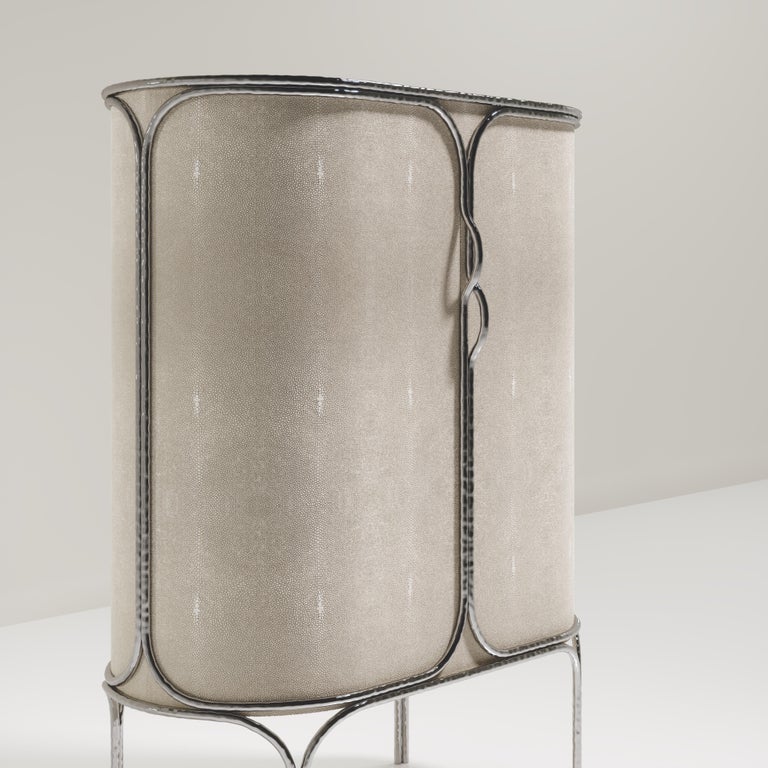 https://a.1stdibscdn.com/shagreen-bar-cabinet-with-chrome-finish-stainless-steel-details-by-ry-augousti-for-sale-picture-5/f_45491/f_359495521693450578440/ARIANE_BAR_D10006_master.jpg?width=768