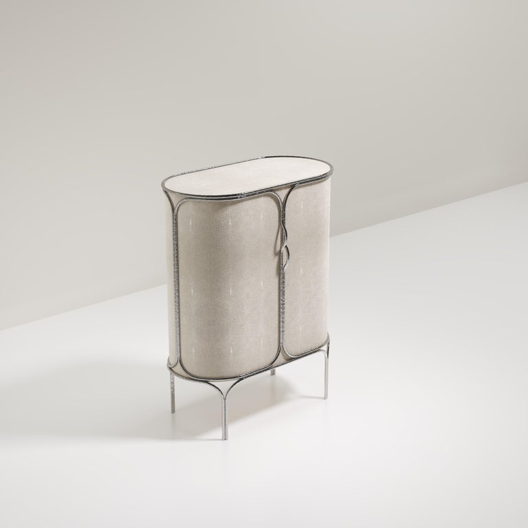 https://a.1stdibscdn.com/shagreen-bar-cabinet-with-chrome-finish-stainless-steel-details-by-ry-augousti-for-sale-picture-3/f_45491/f_359495521693450729608/ARIANE_BAR_D10007_master.jpg?width=768