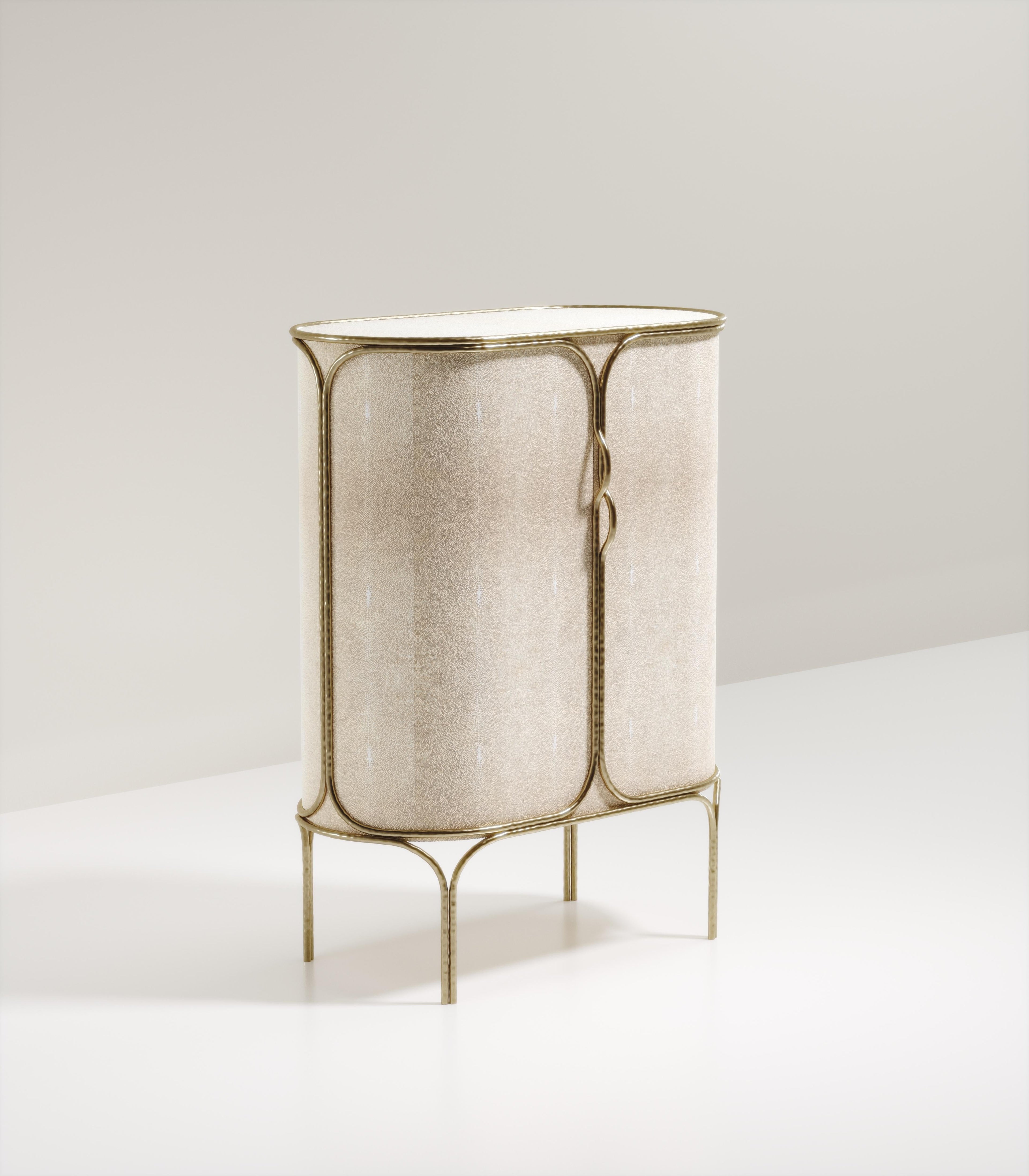 https://a.1stdibscdn.com/shagreen-bar-cabinet-with-bronze-patina-brass-details-by-ry-augousti-for-sale-picture-2/f_45491/f_267866021641419165518/ARIANE_Bar_white_2_master.jpg